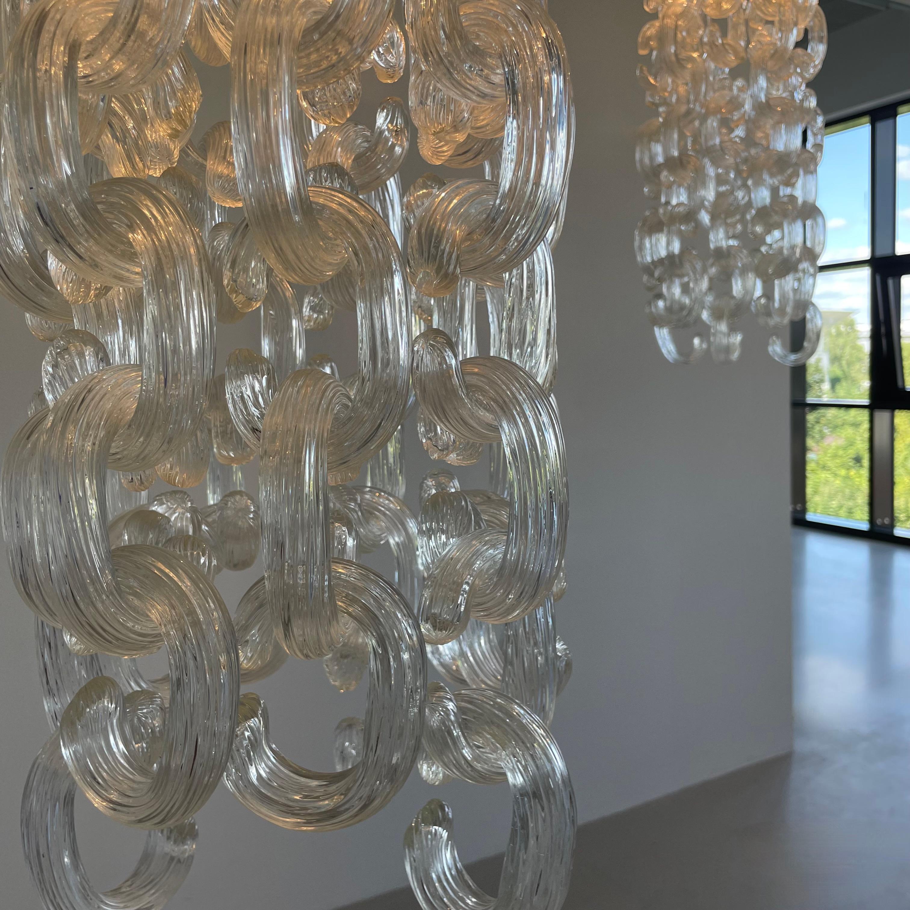 Mid-20th Century Pair of Chandeliers by Giusto Toso 