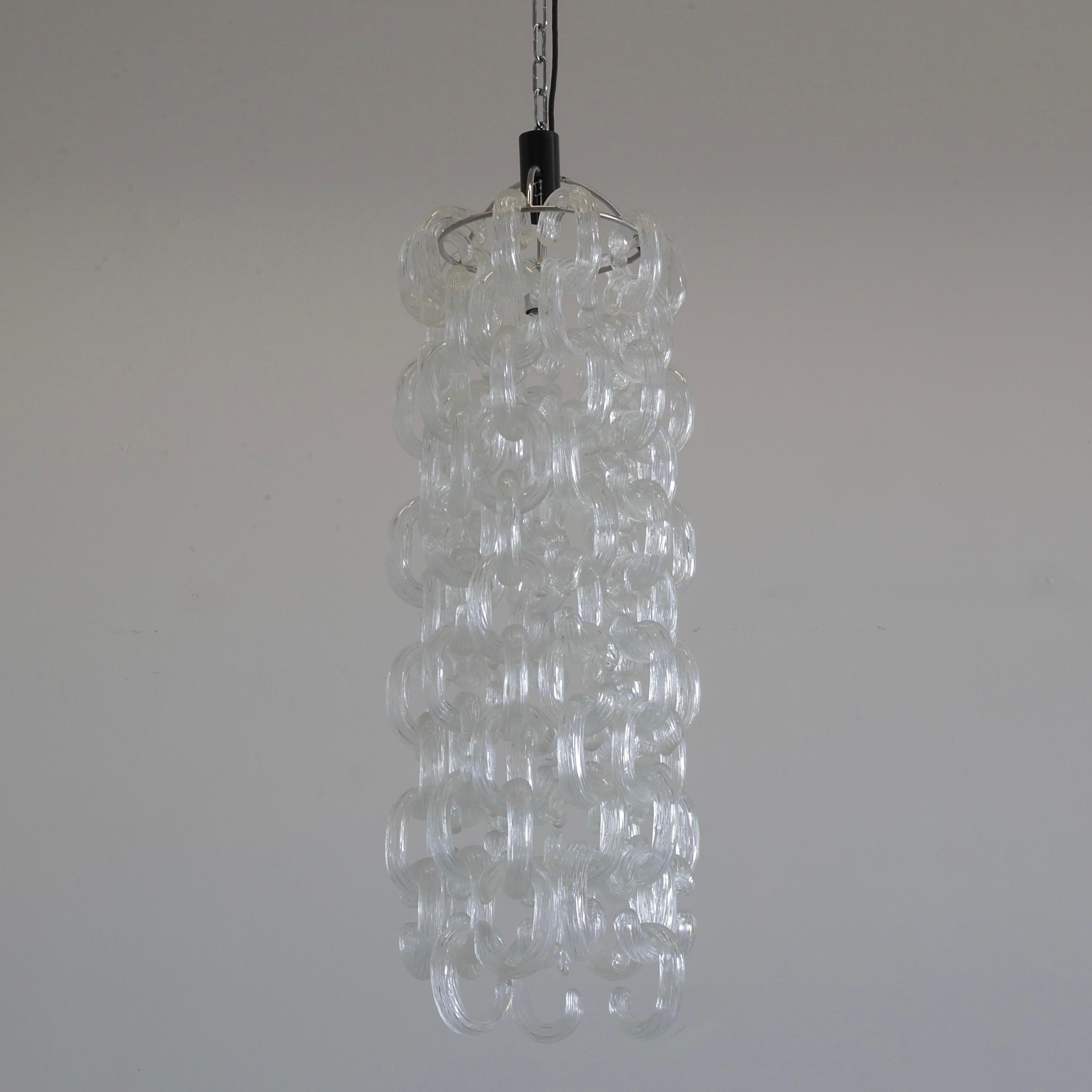 Metal Pair of Chandeliers by Giusto Toso 