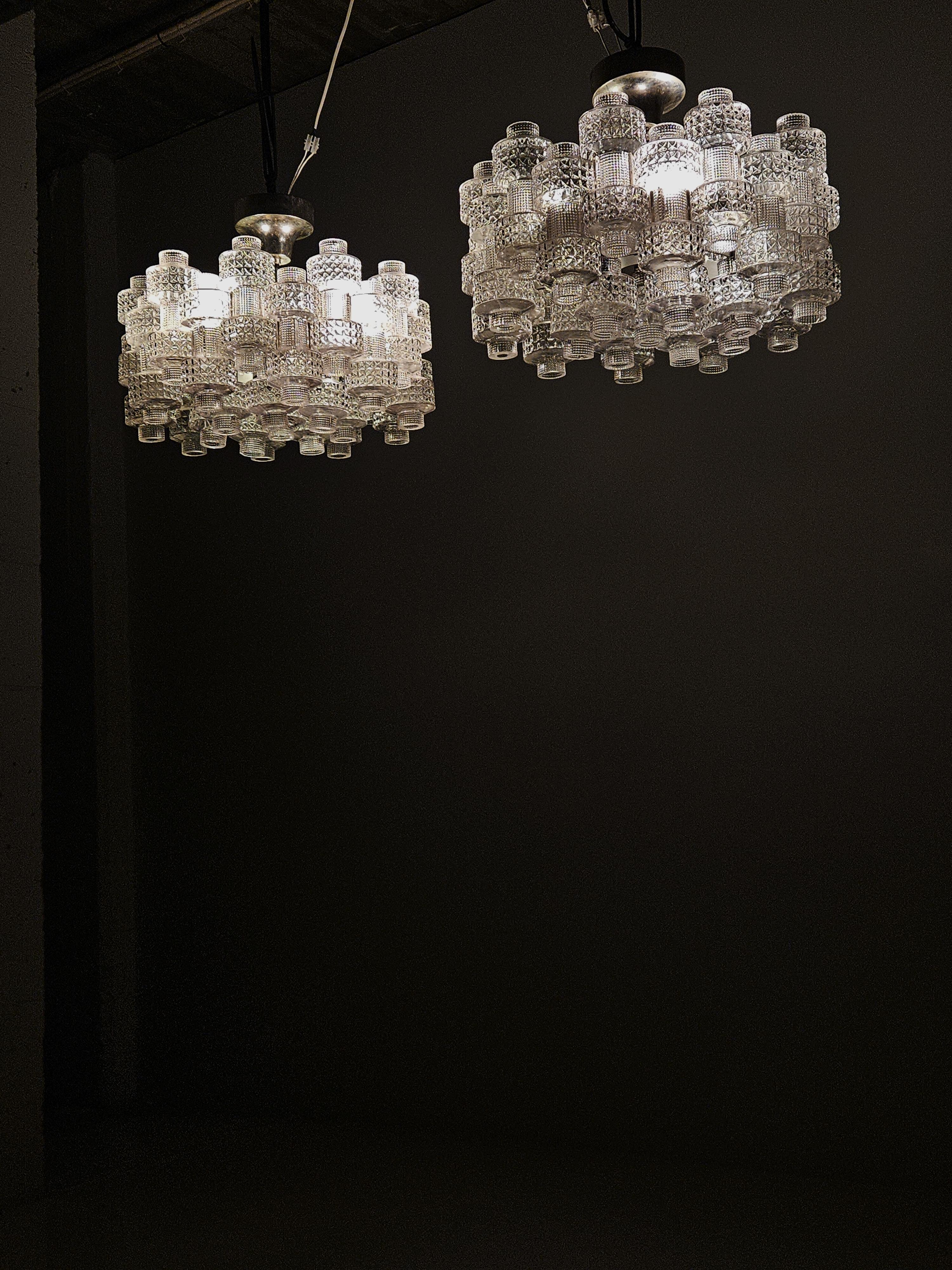 Scandinavian Modern Pair of chandeliers 'Festival' by Gert Nyström for Fagerhult, Sweden, 1970s For Sale