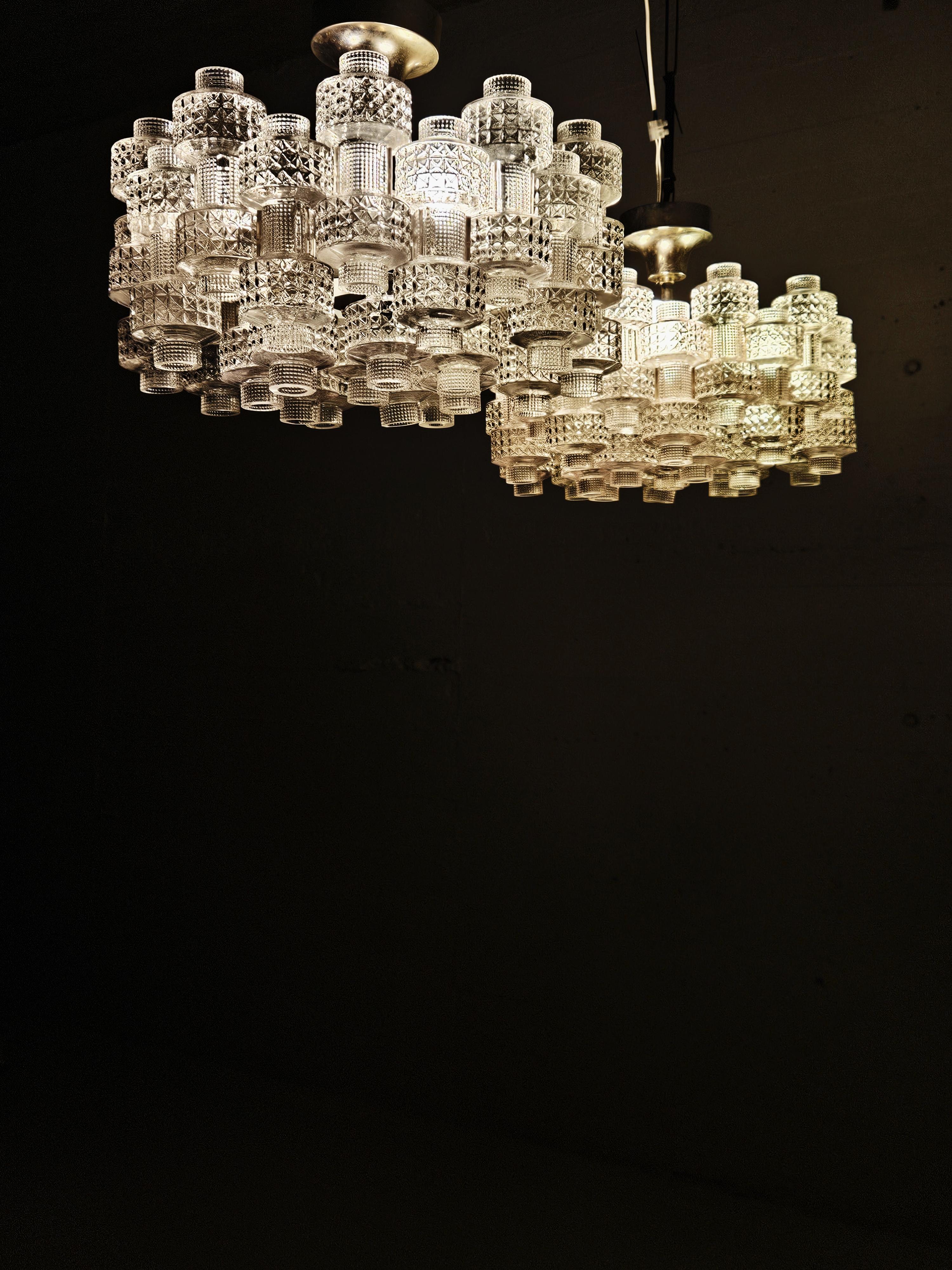 20th Century Pair of chandeliers 'Festival' by Gert Nyström for Fagerhult, Sweden, 1970s For Sale