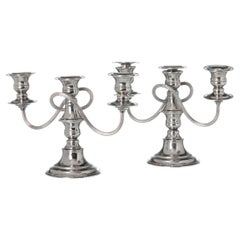 Pair of chandeliers in shell-shaped moldings
