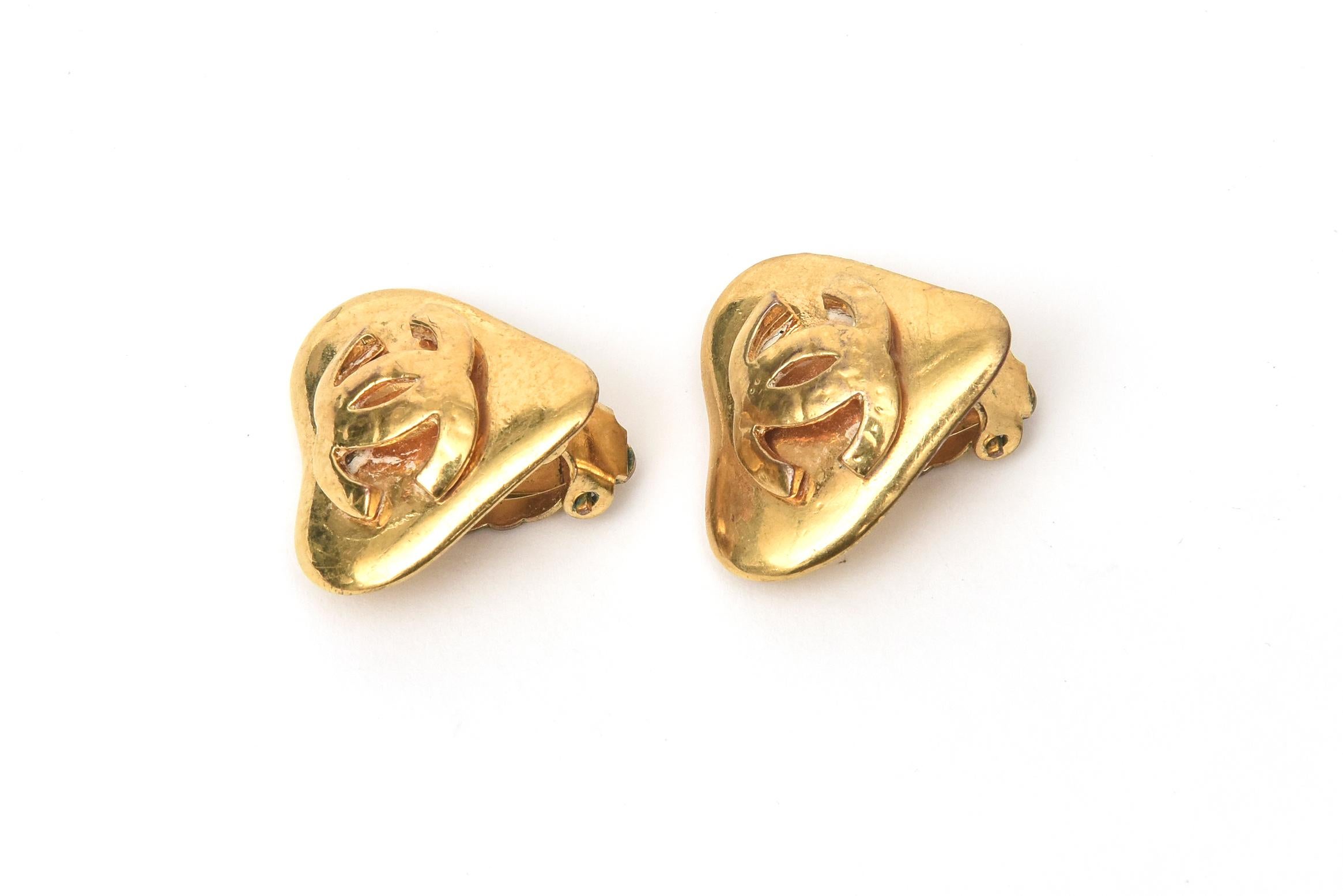 These lovely and charming Chanel CC heart clip on earrings are the smaller size. They were done in 2 sizes. These are more wearable. They are gold plated and from 1986. PLEASE NOTE: THESE WILL BE ON SALE NOW FOR VALENTINE GIFT BUYING.