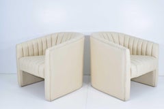 Pair of Channel Tufted Barrel Back Tub Chairs
