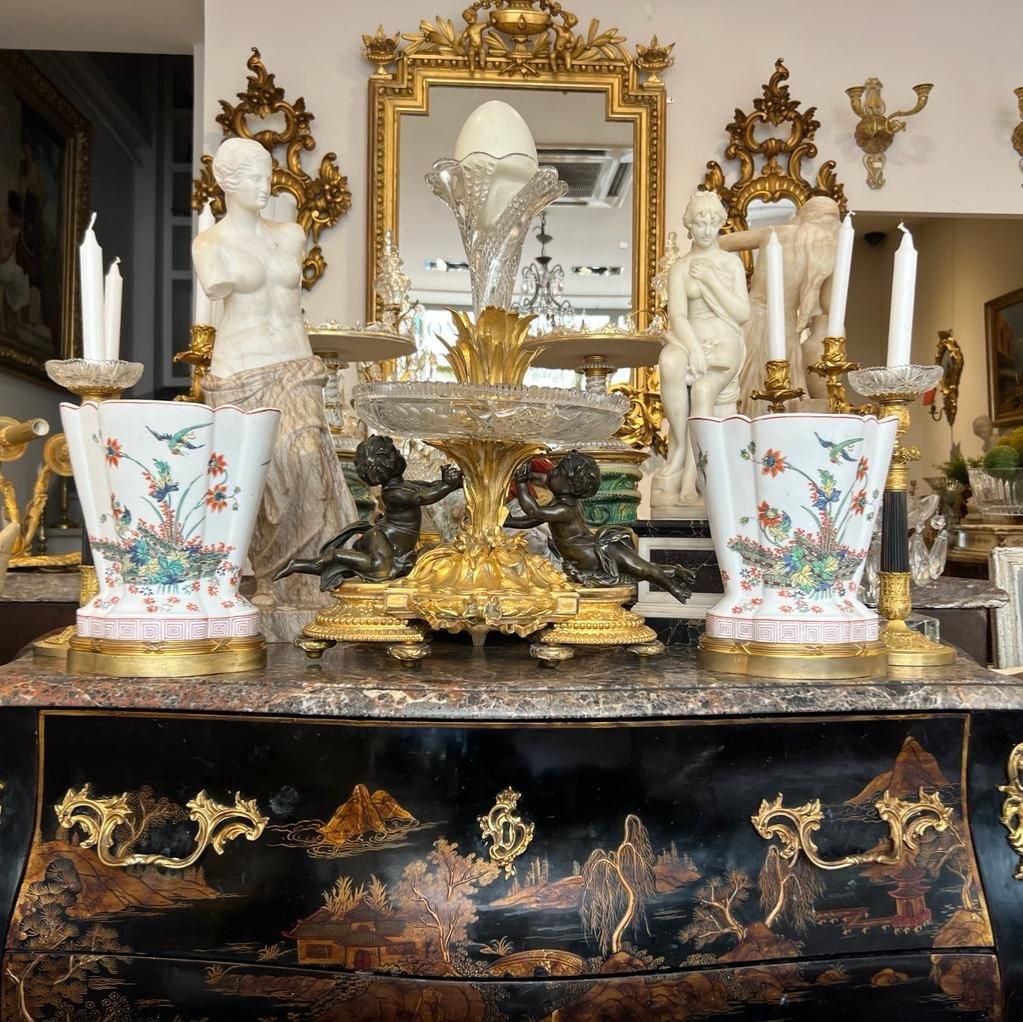 Pair of Polylobed Chantilly Porcelain Vases Mounted on Gilt Bronze Bases, Made by Maison Samson in Paris, Late 19th Century

This elegant pair of polylobed vases in Chantilly porcelain was crafted by the renowned Maison Samson in Paris at the end of