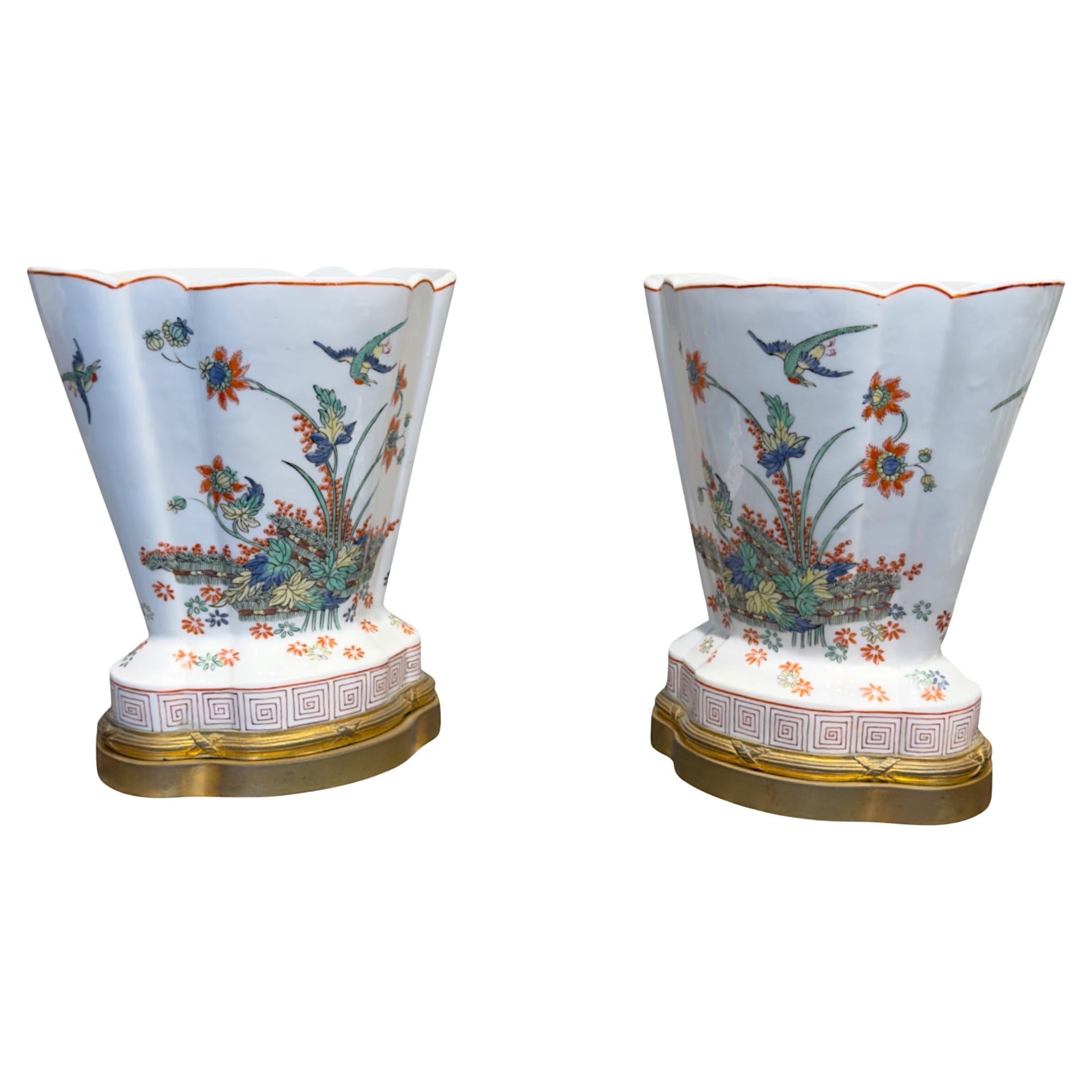 A refined and decorative pair of  porcelain vases in the Chantilly style, attributed to Samson, Paris, and dating to the late 19th century. These vases exemplify the elegance and charm of French porcelain revival pieces, faithfully inspired by the