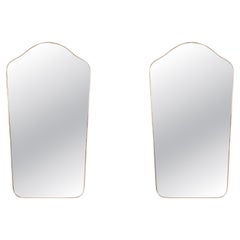 Pair of “chapeau de gendarme” shaped mirrors. 1970s.