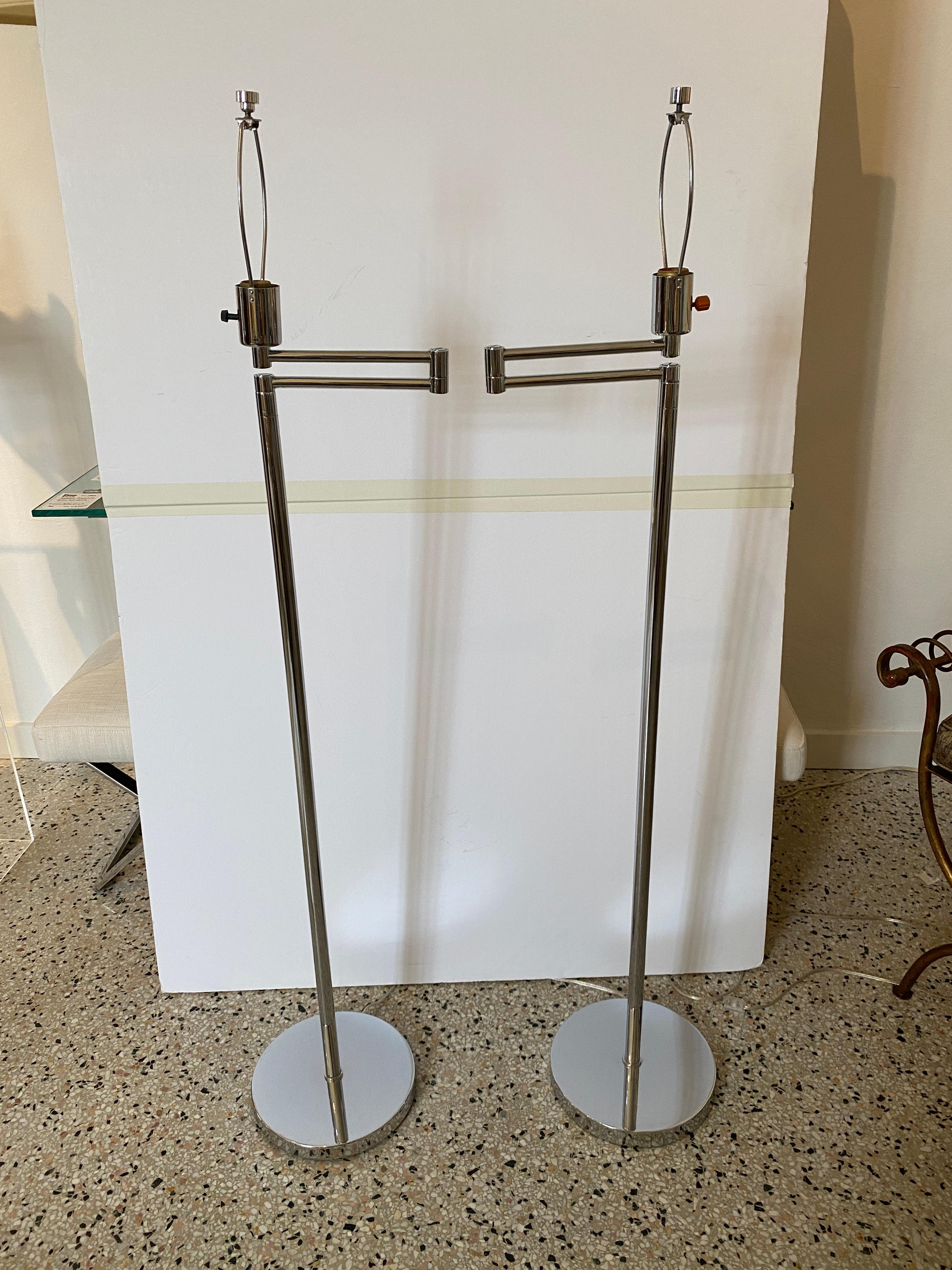 Polished Pair of Chapman Adjustable Floor Lamps For Sale