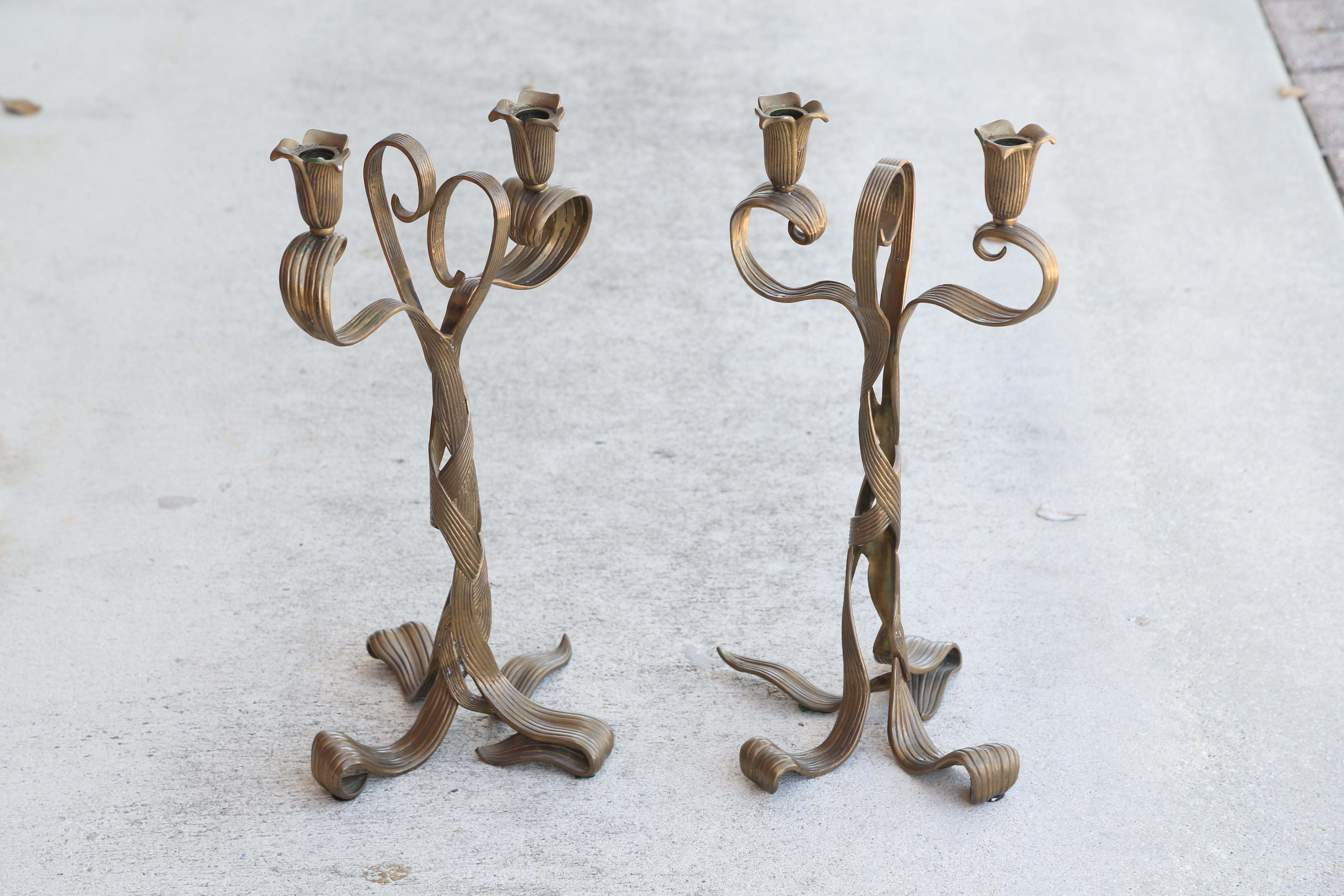 Pair of solid brass Art Nouveau candlesticks by Chapman.