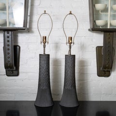 Pair of charcoal "carved" ceramic table lamps