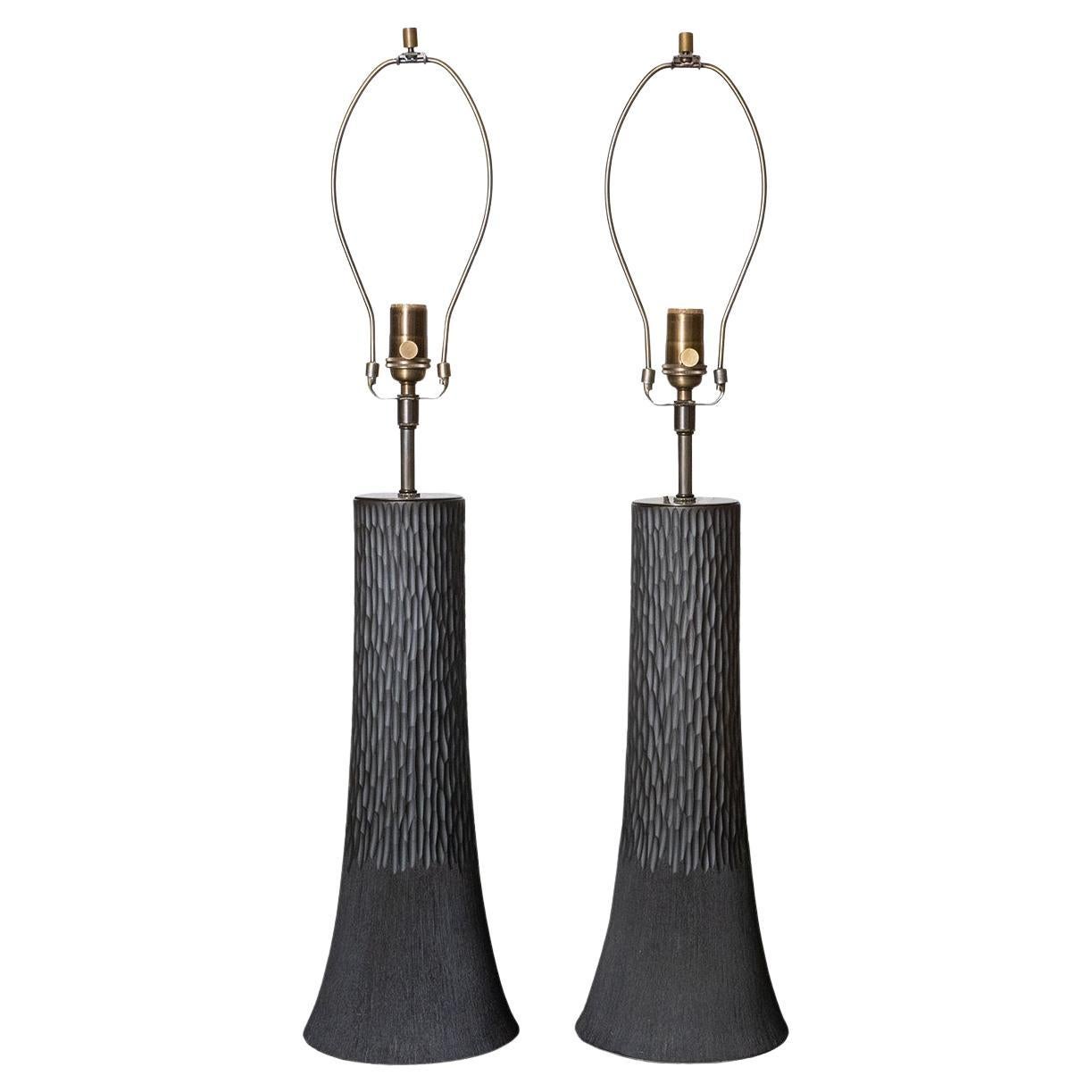 Pair of charcoal "carved" ceramic table lamps