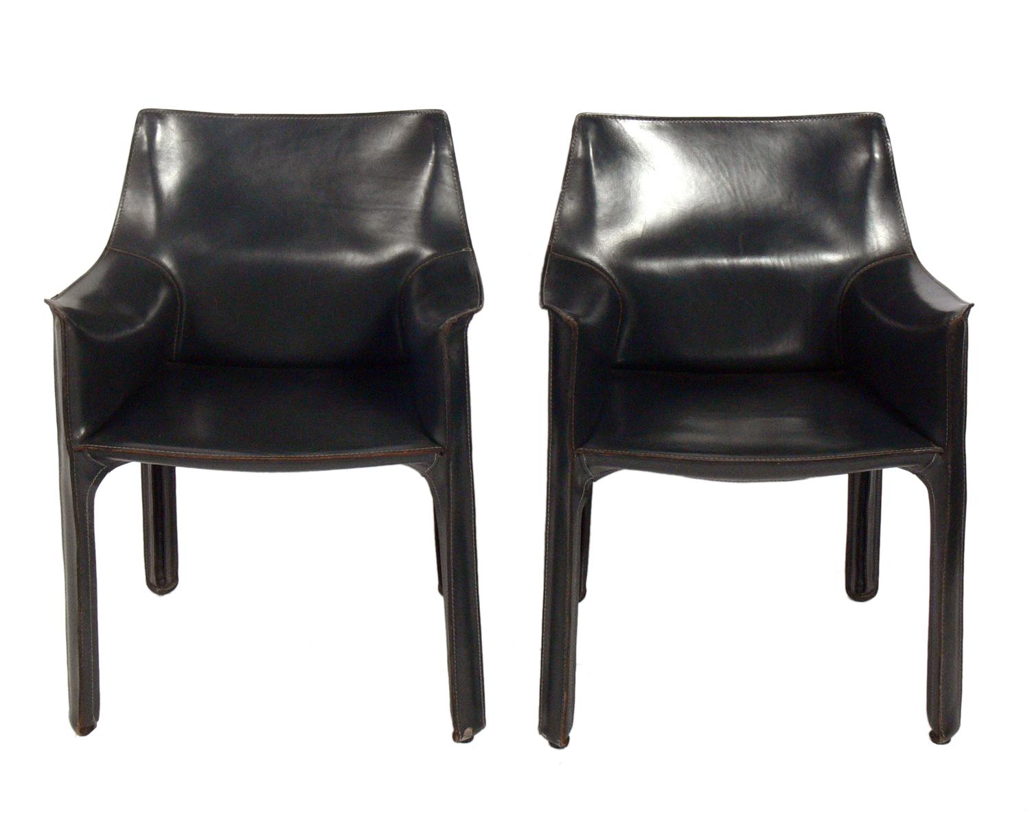Pair of charcoal gray leather cab chairs, designed by Mario Bellini for Cassina, circa 1980s.