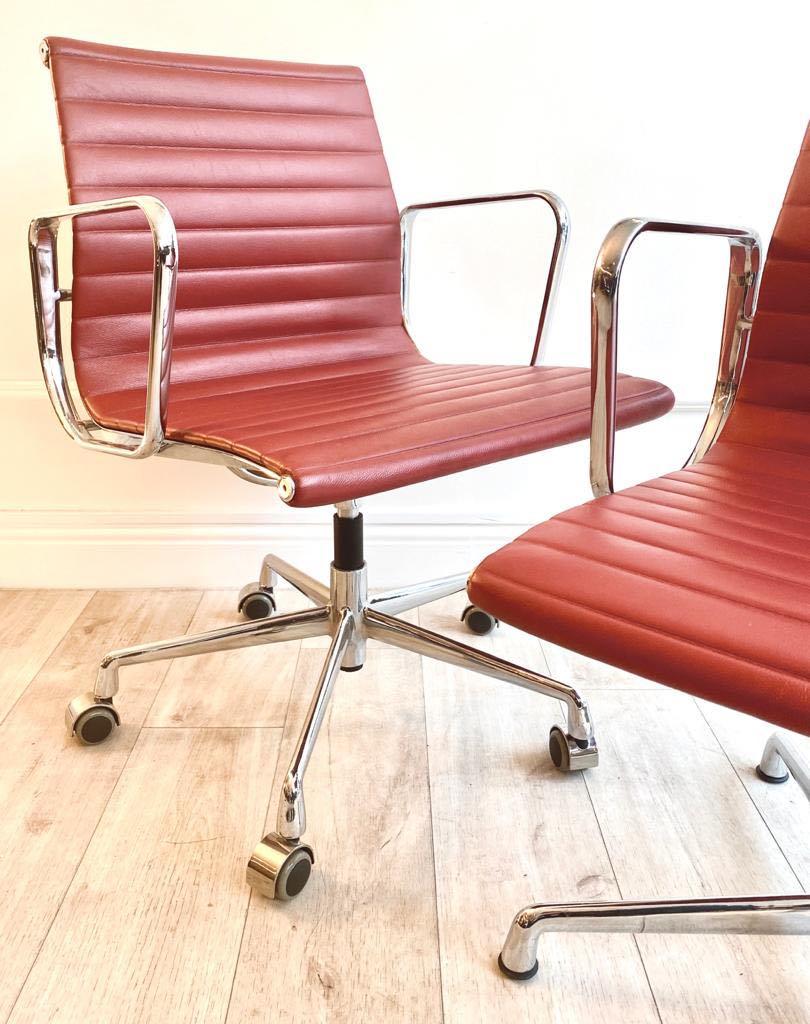 Mid-Century Modern Pair of Charles and Ray Eames Office Chairs in Red Leather