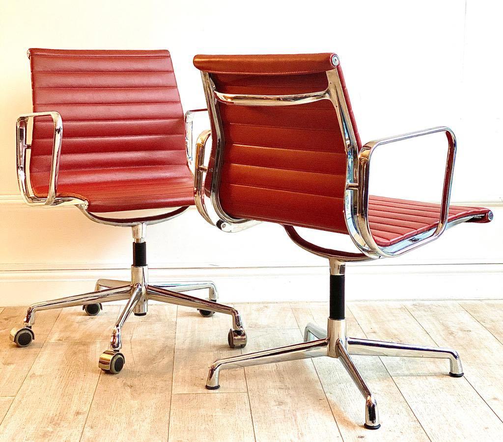 Italian Pair of Charles and Ray Eames Office Chairs in Red Leather