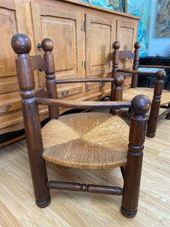 Pair of Charles Dudouyt Low Oak Armchairs with Rush Seats