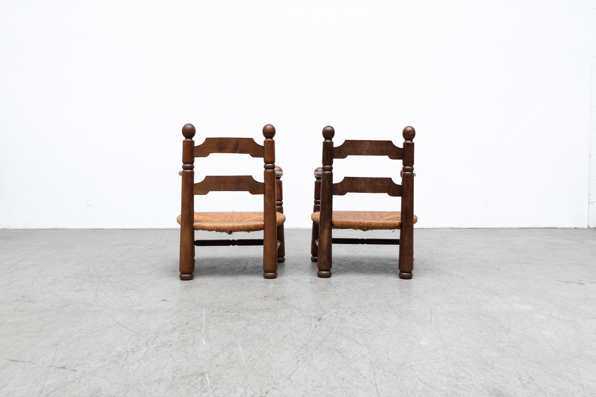 Mid-20th Century Pair of Charles Dudouyt Oak and Papercord Arm Chairs