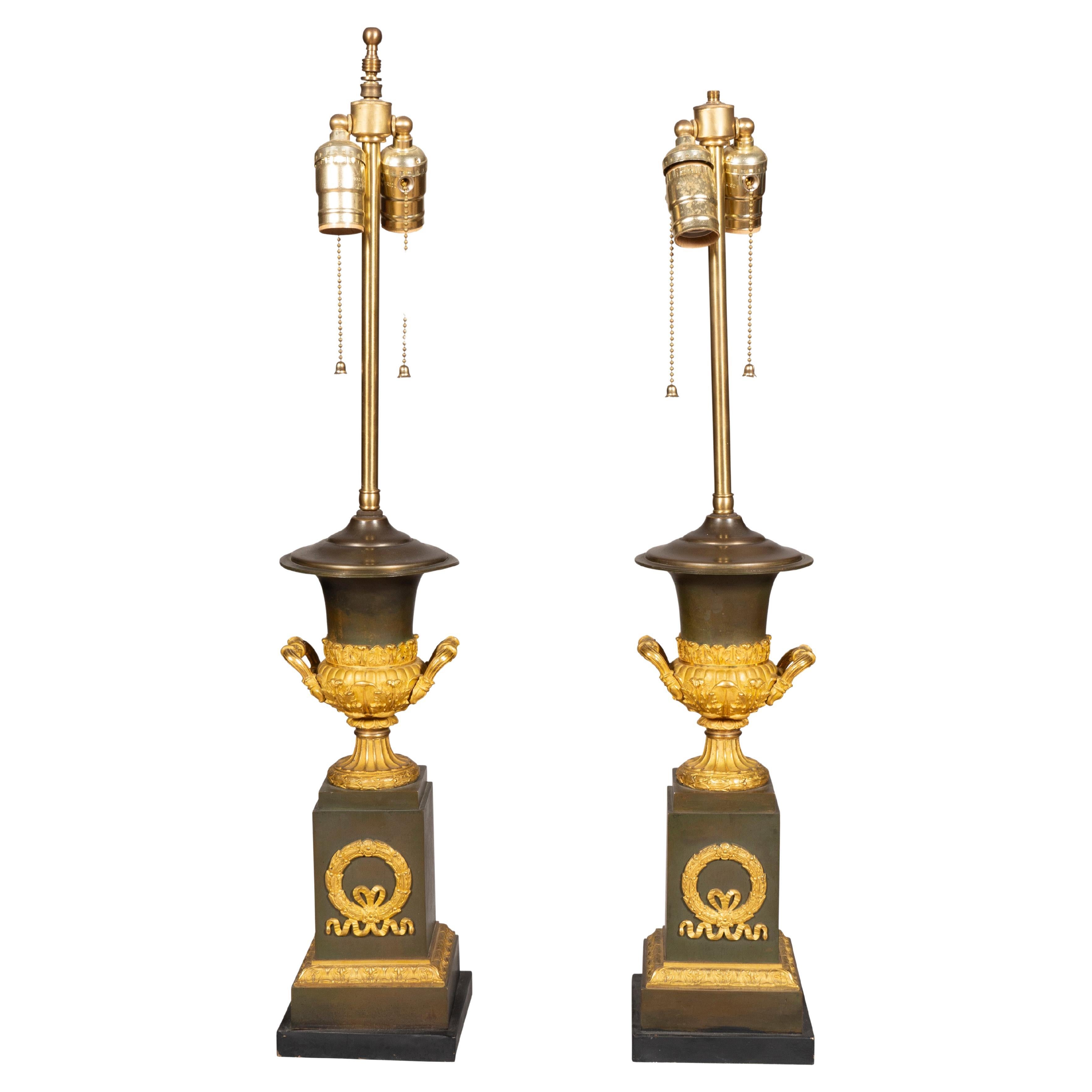 Paire de lampes de bureau Charles X en bronze et bronze doré
