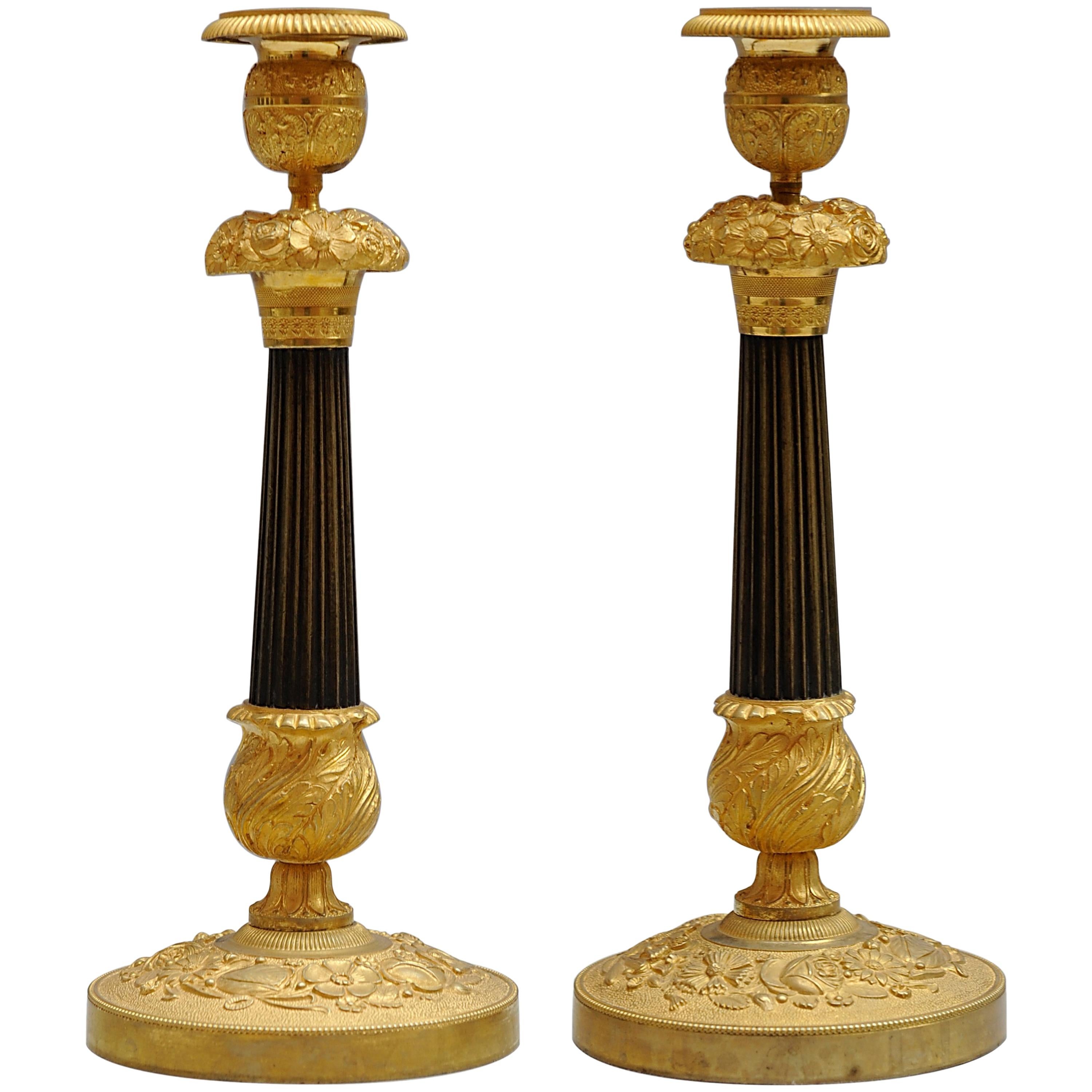 Pair of Charles X Candlesticks in Ormolu and Patinated Bronze For Sale