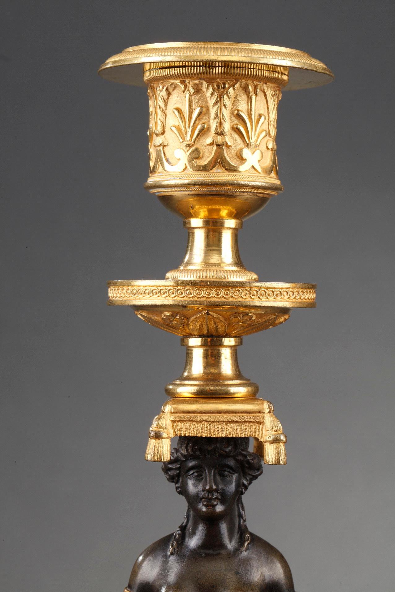 Gilt Pair of Charles X Candlesticks in Patinated and Gilded Bronze