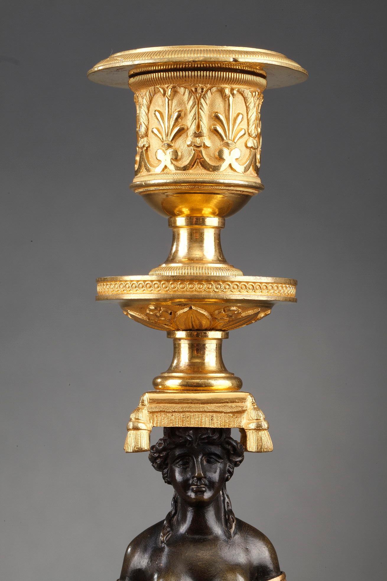 Pair of Charles X Candlesticks in Patinated and Gilded Bronze In Good Condition In Paris, FR