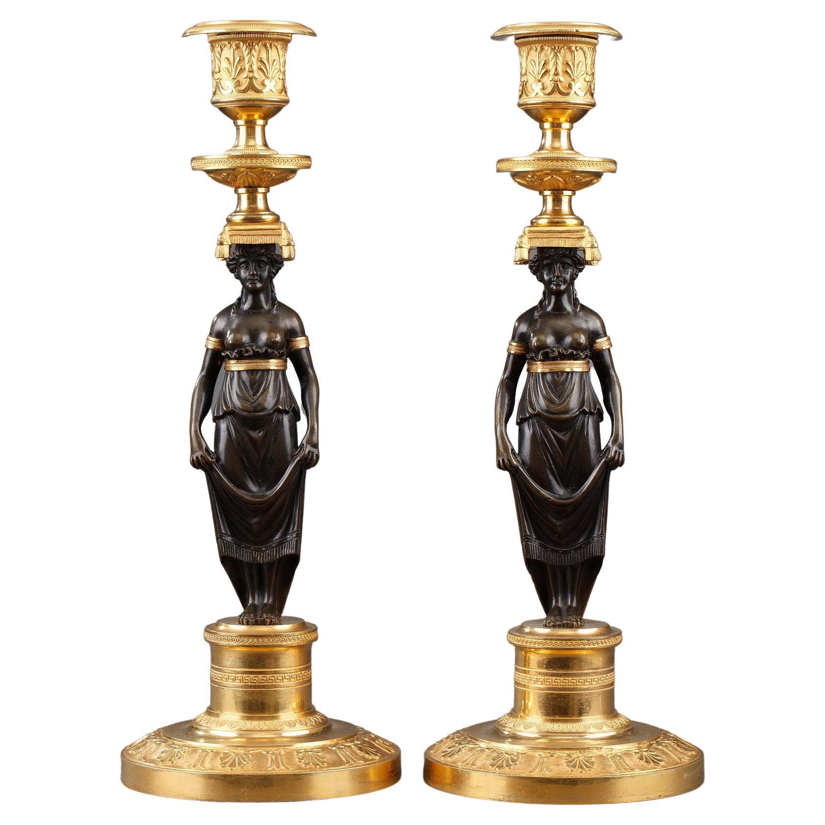 Pair of Charles X Candlesticks in Patinated and Gilded Bronze For Sale at  1stDibs