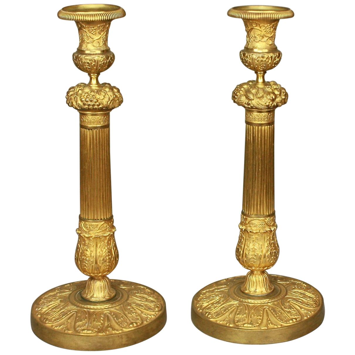 Pair of French Early 19th Century Charles X Gilt-Bronze Candlesticks, circa 1825