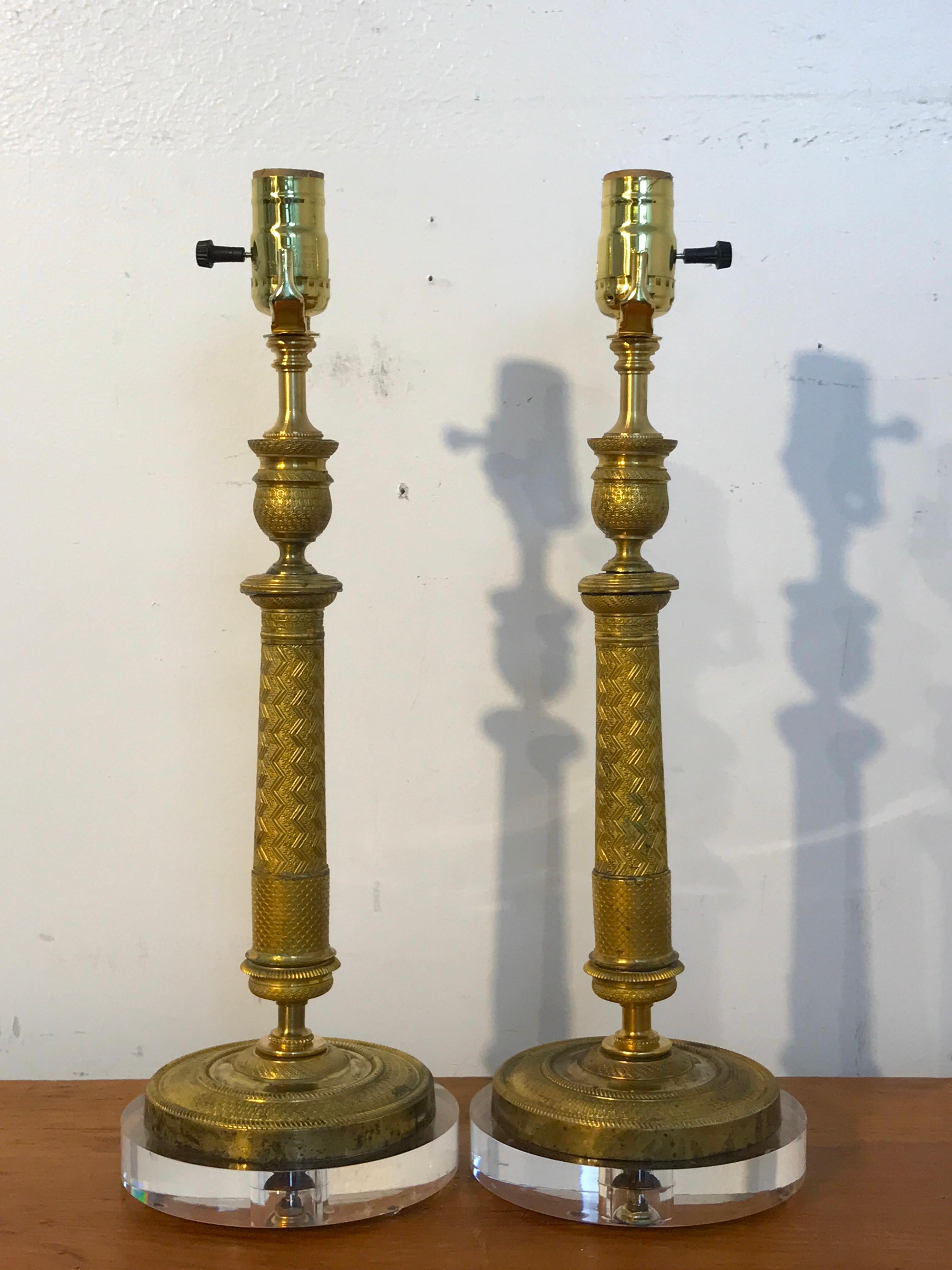 Pair of Charles X Ormolu candlesticks, now as lamps, each one with fine diagonal engine turning chasing, raised on a thick 6