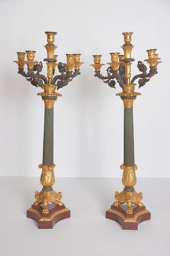 Pair of Charles X Patinated and Gilt Bronze Candelabra