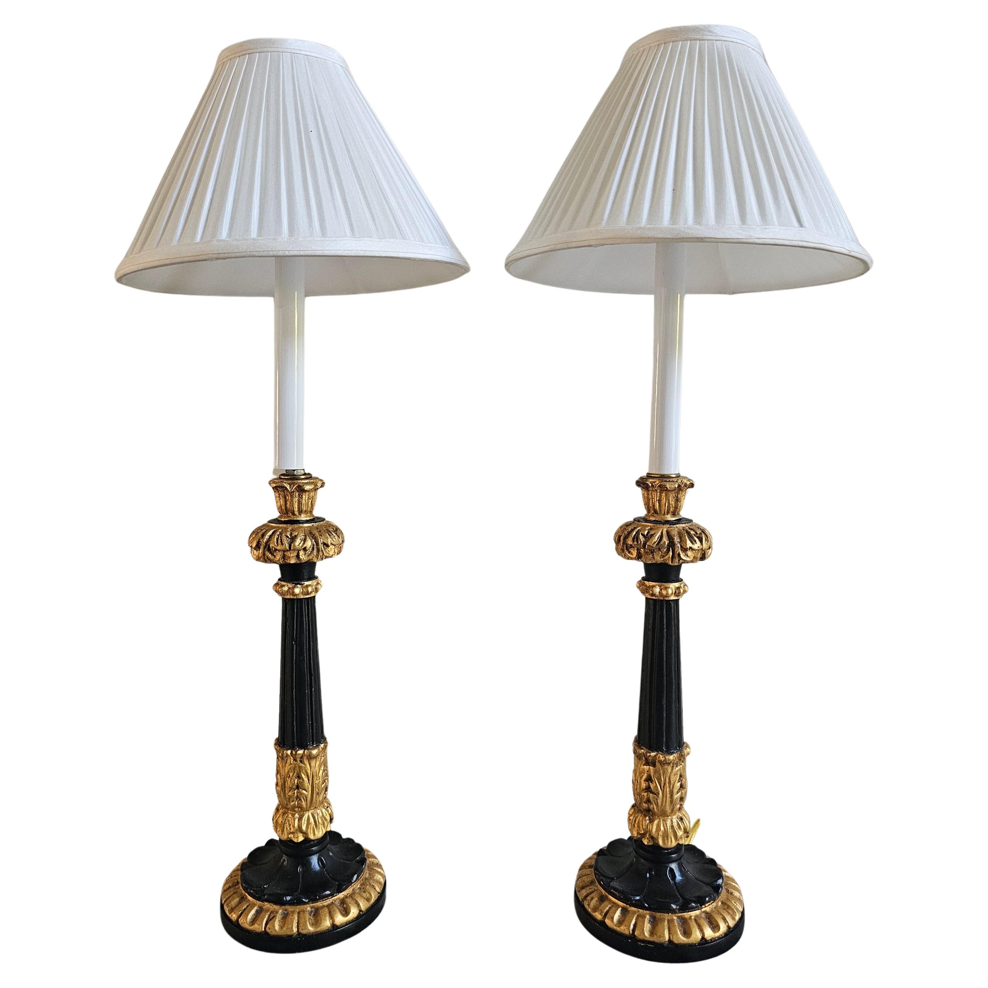 Paire de chandeliers en bois doré et émail noir montés en lampe, Charles X St. en vente