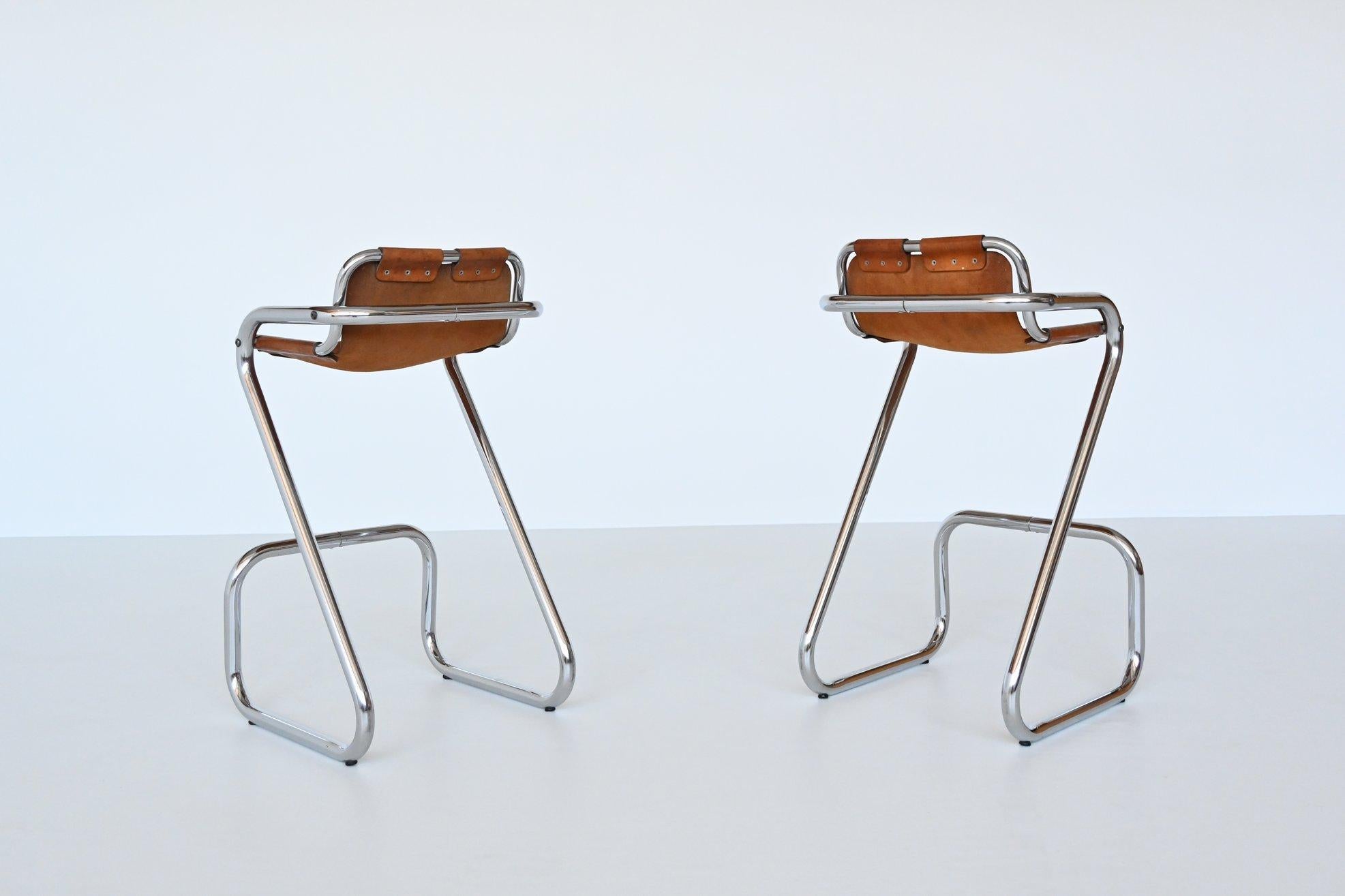 French Pair of Bar Stools in the style of Charlotte Perriand
