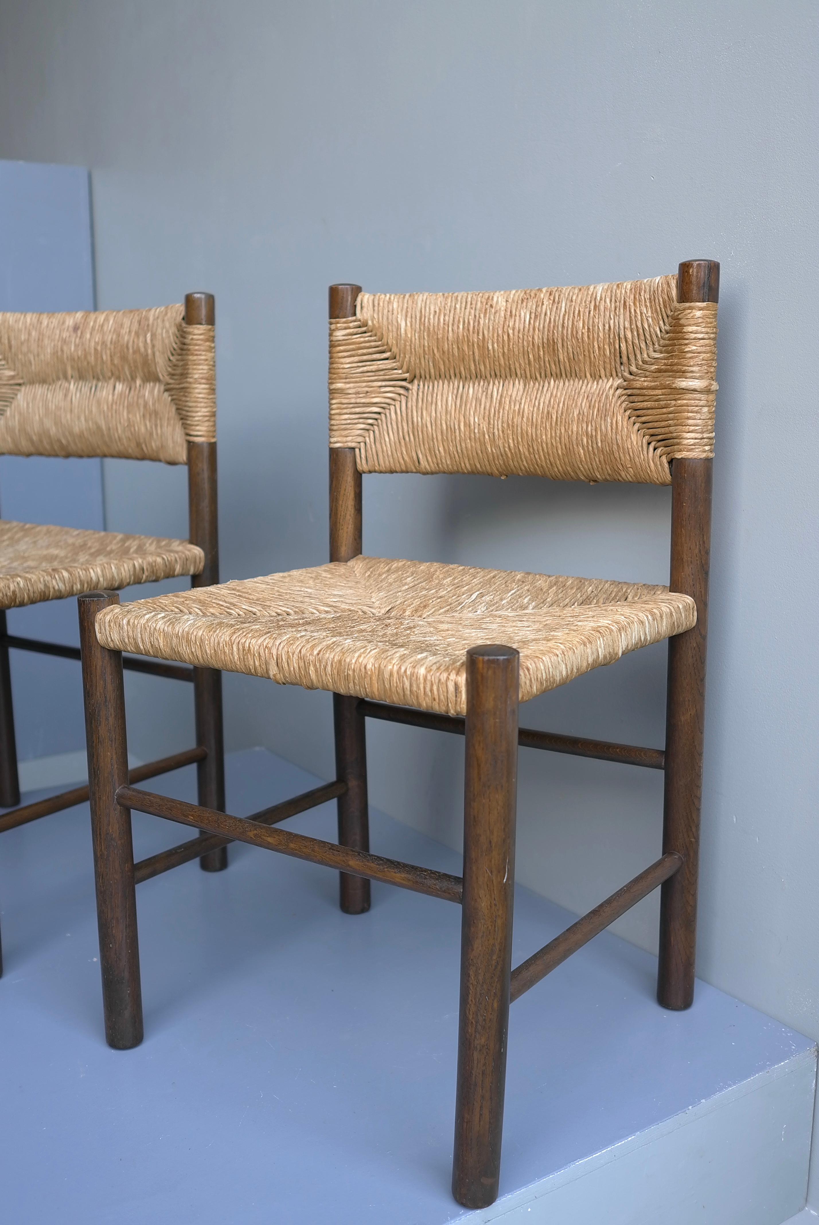 French Pair of Charlotte Perriand 'Dordogne' Chairs in Wood and Rush, France, 1960's