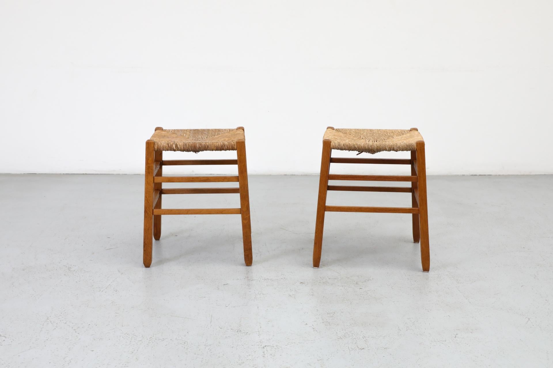 Mid-Century Modern Pair of Charlotte Perriand Inspired Primitive Oak Stools with Rush Seats