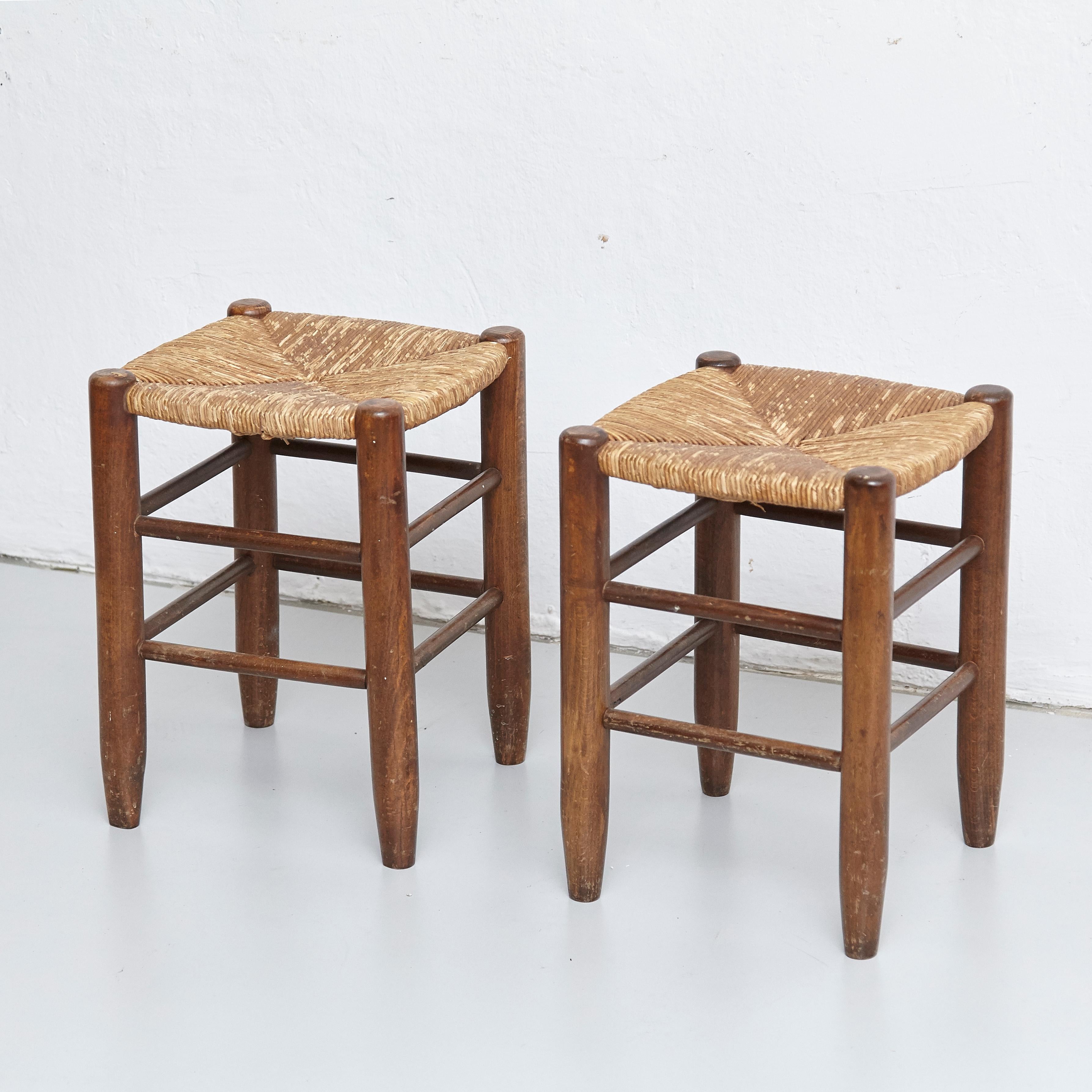 Pair of Charlotte Perriand, Mid-Century Modern, Rattan Wood French Stools In Good Condition In Barcelona, Barcelona