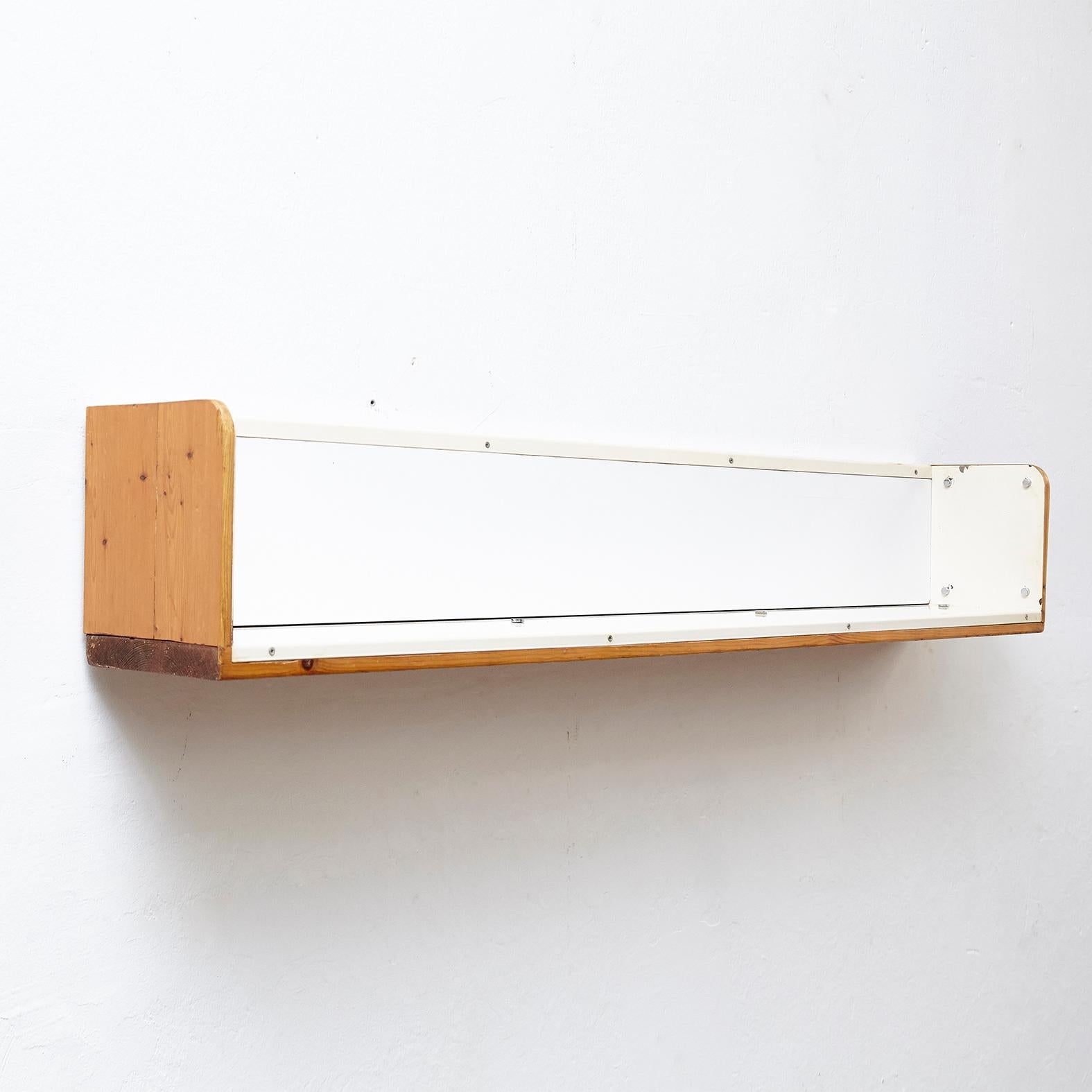 Shelves designed by Charlotte Perriand for Les Arcs, circa 1960, manufactured in France.
Pinewood and metal. 

In good original condition, with minor wear consistent with age and use, preserving a beautiful patina.

Charlotte Perriand