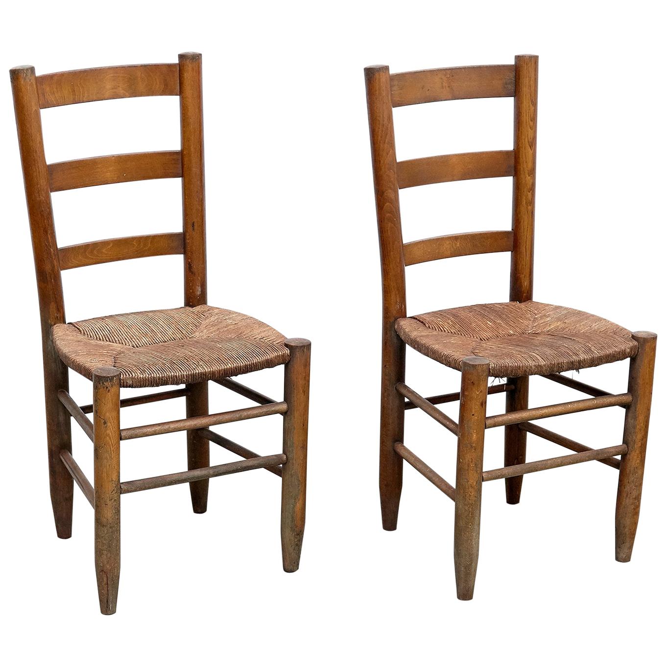 Pareja de sillas francesas Charlotte Perriand Mid Century Modern Wood Rattan, Nº 19