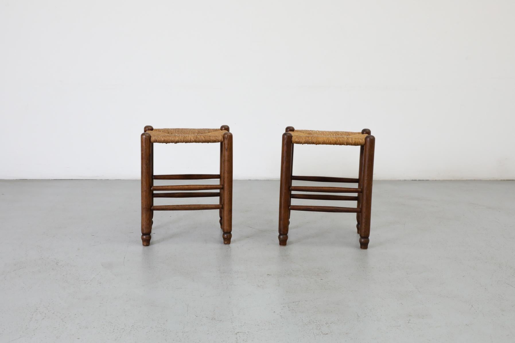 Mid-Century Modern Pair of Charlotte Perriand Style Mini Stools with Dark Oak Frames and Rush Seats