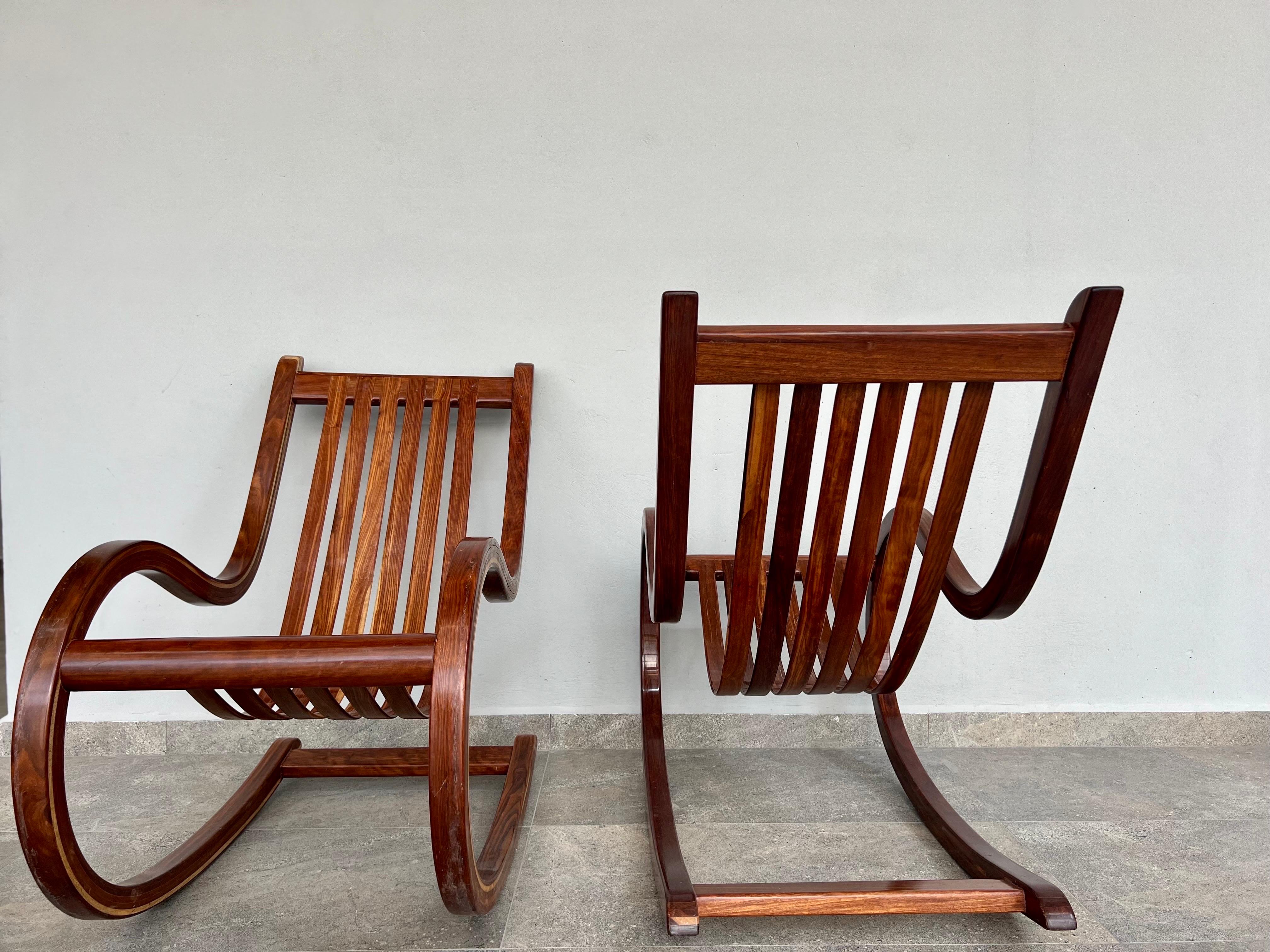 Rosewood Pair of Che-Chent Rocking Chairs by Salvador Vidal For Sale
