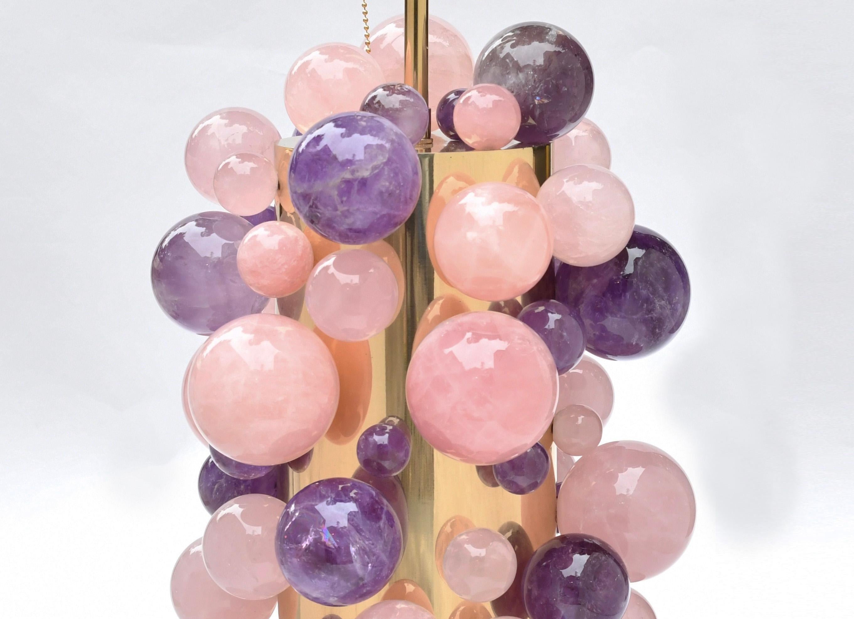 Pair of amethyst and pink rock crystal bubble lamps with polished brass finish. Created by Phoenix Gallery, NYC.
To the top of rock crystal part: 17
