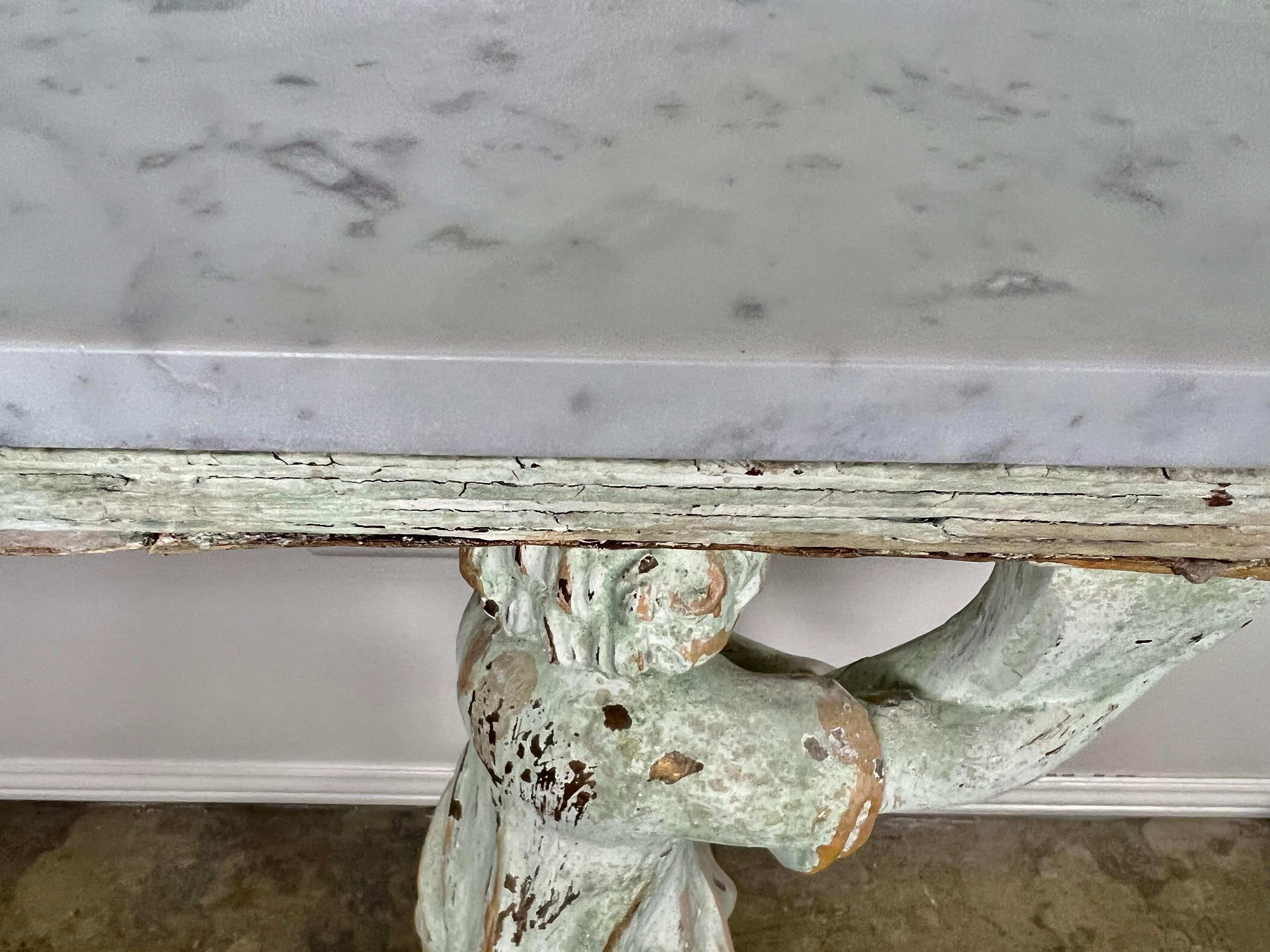 Pair of Cherub Consoles with Marble Tops, circa 1930s For Sale 11