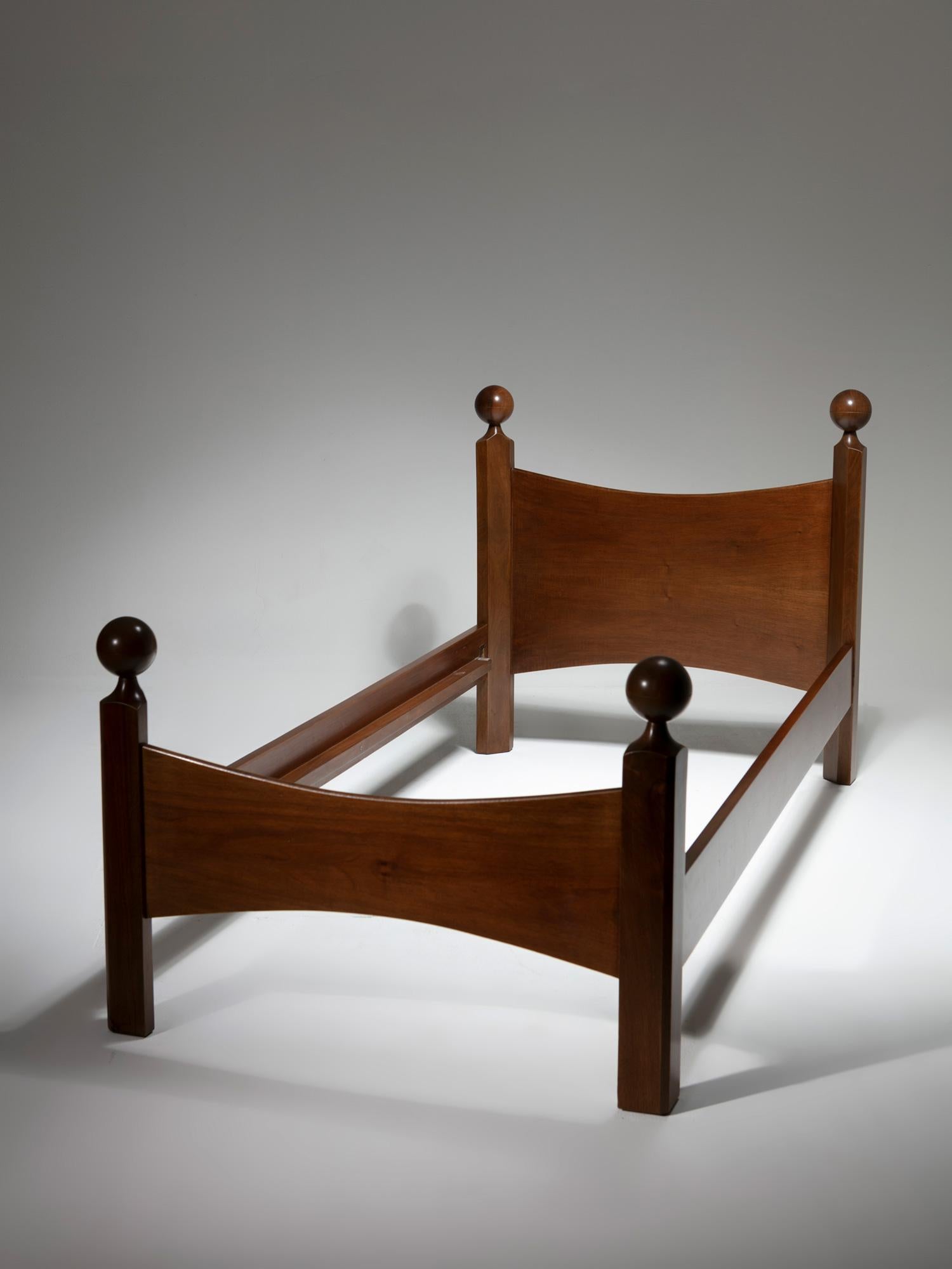 Set of two Chesa Laria single beds frames by Luigi Caccia Dominioni for Azucena.
Solid walnut frame with sculptural ends.