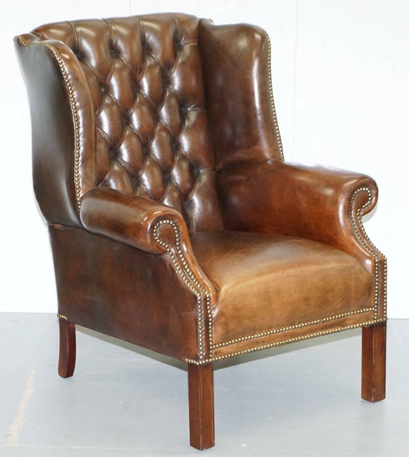 We are delighted to offer for sale this stunning pair of Vintage hand dyed cigar brown leather Chesterfield wingback armchairs and matching footstool

A lovely little suite that was fully restored 2-3 years ago, the old color was stripped out and