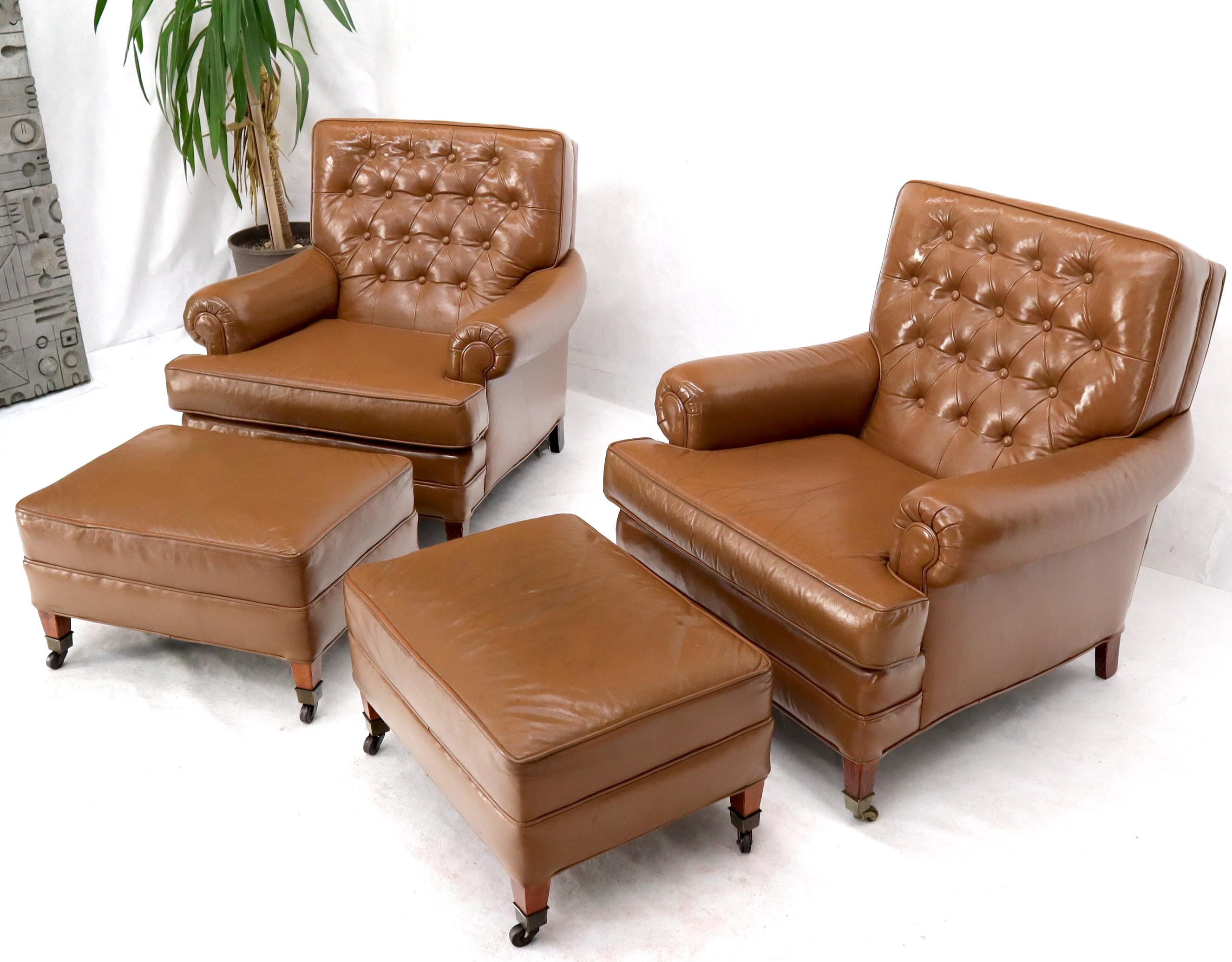 Pair of circa 1960's Chesterfield style brown to tan leather chairs with a pair of matching ottomans foot rests stools. Ottoman dimensions: 18 x 24 x 14.