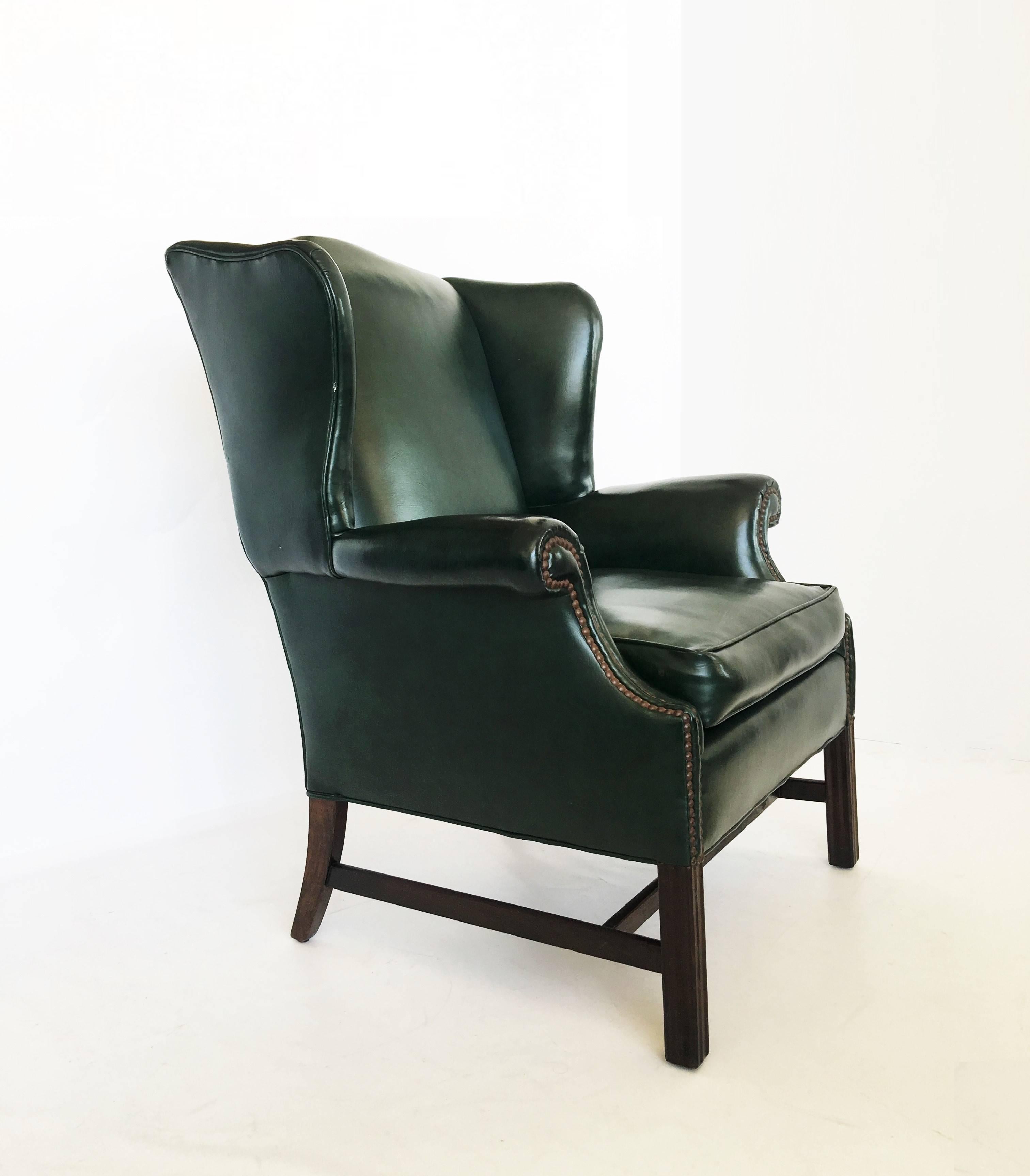 English Pair of Chesterfield Tufted Dark Green Leather Wingback Chairs For Sale