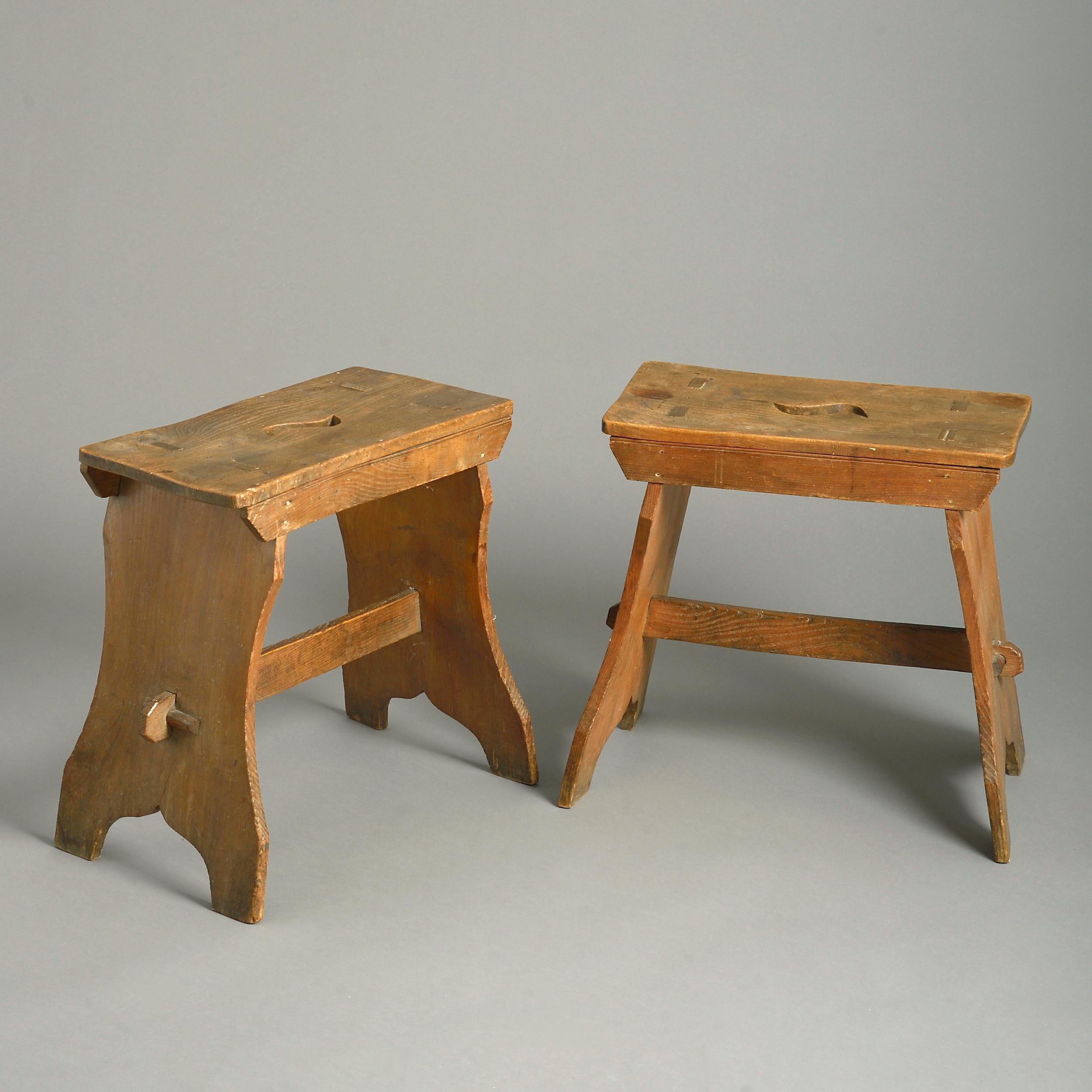 A pair of vernacular chestnut stools, circa 1830.

Provenance: from a non-conformist chapel in the West Midlands built in 1832.