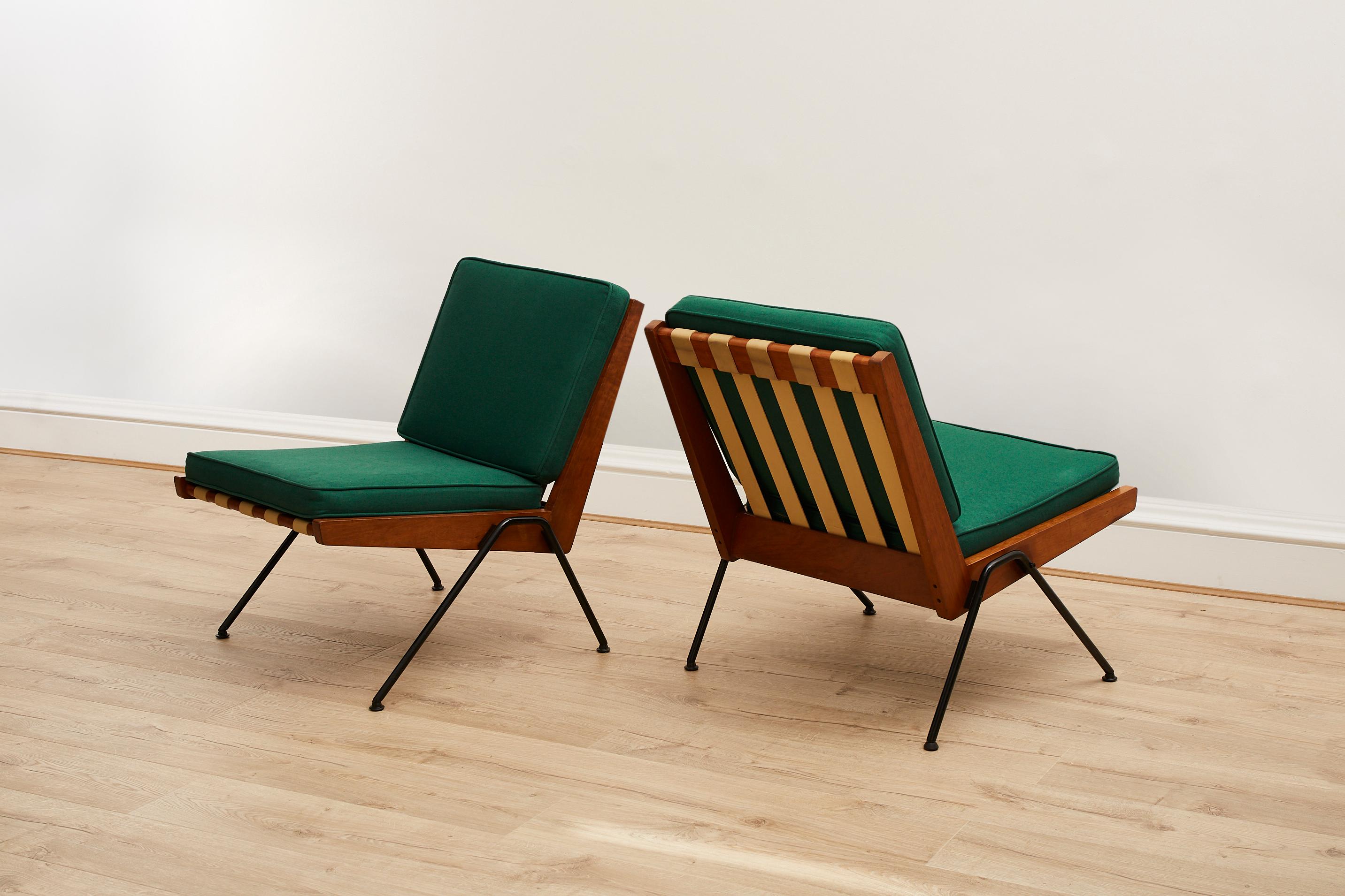  super cool & rare pair of Robin Day Chevron Chairs for Hille, crafted during the 1950s, these chairs are a tribute to the innovative mind of Robin Day and his enduring impact on furniture design, an influential figure in 20th-century British