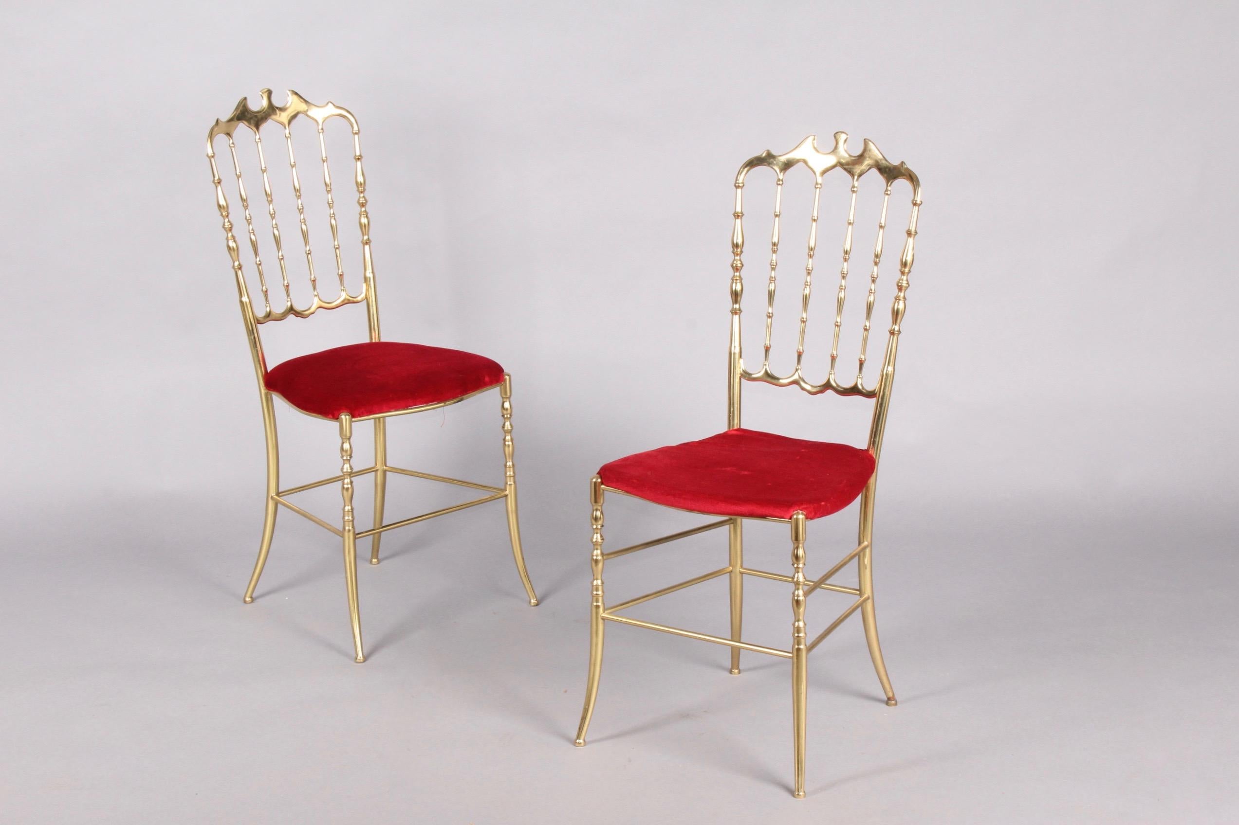 Pair of Chiavari brass chairs.
