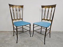 Pair of Chiavari Side Chairs made of solid brass with baby blue plush seats