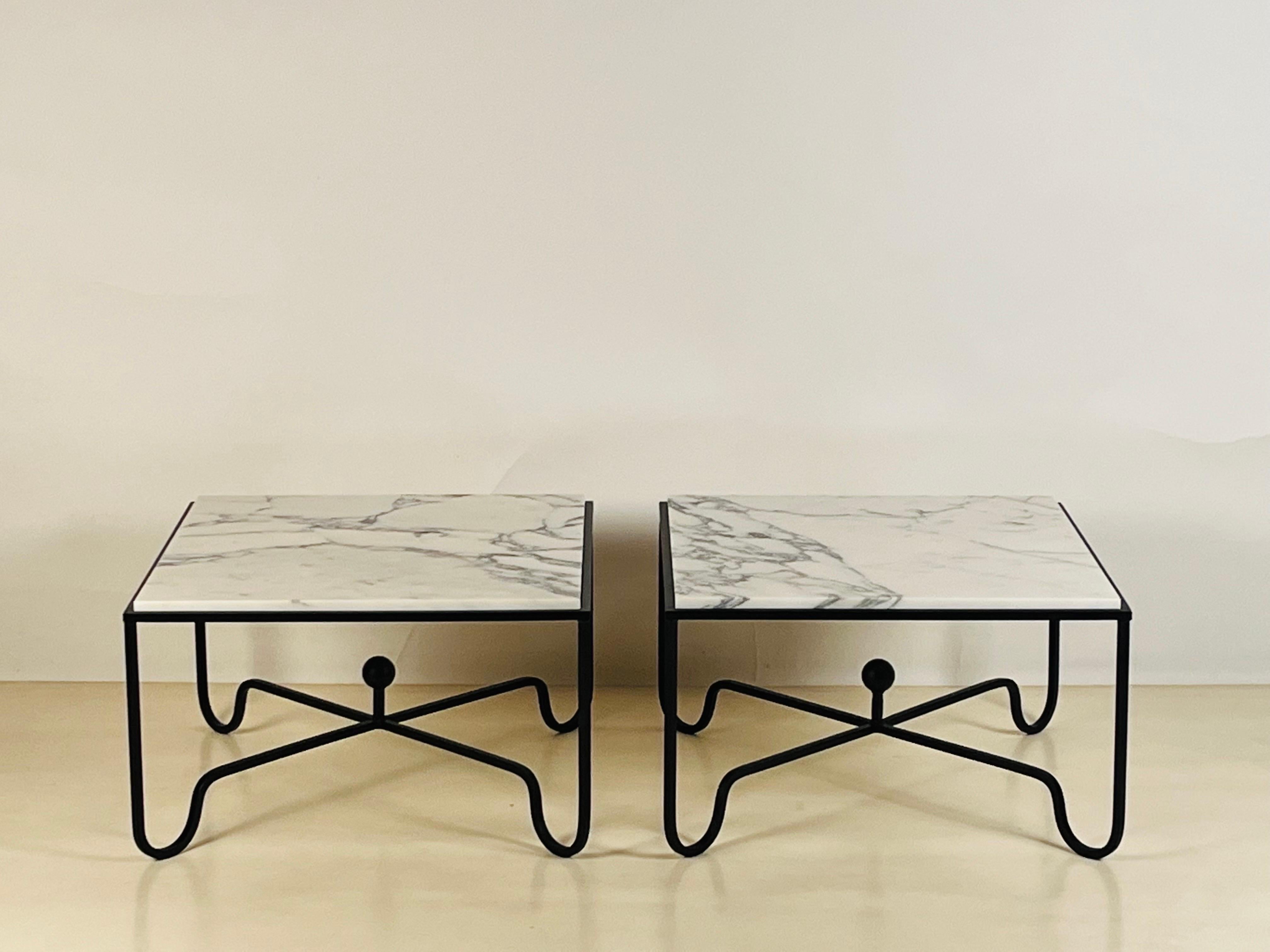 Pair of Arabescato marble 'Entretoise' side or end tables by Design Frères. Chic and understated.

Also great as a 2-part coffee table.
 