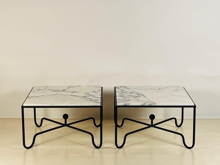 Pair of Arabescato marble 'Entretoise' side or end tables by Design Frères. Chic and understated.

Also great as a 2-part coffee table.
 