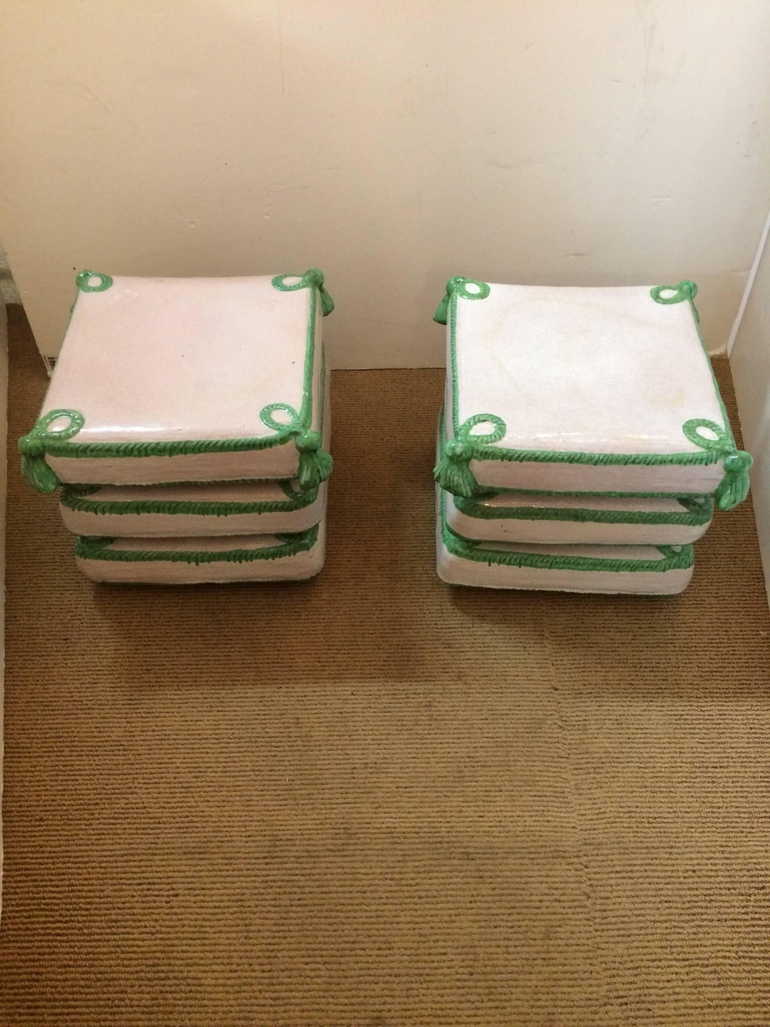 Two super stylish square terracotta garden seats in off-white and green having a twisted rope and tassel decoration. Very versatile measurements to make them function as drinks tables, or paired to make a low coffee table, or as ottomans. Great