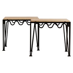Pair of Chic 'Méandre' Black Iron and Travertine Side Tables by Design Frères
